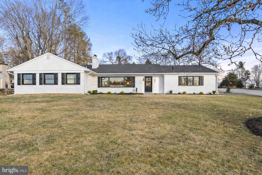 Completely reimagined with a focus on quality, design, and functionality, this exceptional Springfield residence offers refined single level living in the highly sought after Springfield School District. Set on a prominent corner homesite, the home welcomes you with a light filled interior anchored by a dramatic picture window that frames serene western views. The openconcept layout is centered around a thoughtfully designed gourmet kitchen featuring an oversized island, an integrated wine refrigerator, and custom finishes flowing seamlessly into a newly constructed family room addition designed for both everyday living and entertaining. Throughout the home, Restoration Hardware inspired designer lighting adds a cohesive, elevated aesthetic. The living room offers warmth and character with a classic wood burning fireplace, creating an inviting focal point. The owner’s suite is designed as a true retreat, offering dual closets including a walk-in with a custom built-in organization system. The spa inspired bath is finished with a floating vanity illuminated by subtle LED lighting, a full marble shower with lighted niche, and a frameless glass enclosure. The fully finished lower level expands the home’s versatility with a custom wet bar featuring wine storage and refrigeration, a spacious recreation area, a full tile bath, and a flexible space ideal for a home office, guest suite, or additional bedroom. A full walk up attic provides exceptional additional storage an often-overlooked feature that adds meaningful convenience. Extensive upgrades including new windows, roof, HVAC, electrical, and plumbing deliver a true turnkey experience. A turned two car garage and generous outdoor space enhance the home’s overall appeal Ideally located just minutes from downtown Media’s vibrant dining scene, shopping and dining in Springfield, and with convenient access to Philadelphia and the airport, this home offers the perfect balance of lifestyle and location.