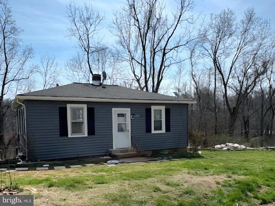 Beautifully situated in the heart of Hamilton, this property offers a peaceful setting with the charm of Loudoun County living. Located on Holmes Mill Rd, this 3 bedroom, 1 bath rambler provides privacy while remaining conveniently close to local shops, dining, route 7 and route 15.  Inside find a cozy layout featuring a specious family room and kitchen.  As you go to the botton part of the home through the back of the property,  you will find an unfinished level with lots of potential and that has been reenforced by the owner since they bought it. Updated items include Roof installed in 2021, HVAC 2020, Water heater 2020. This is the 2nd owner of this property.  
Enjoy the surrounding open space and serene atmosphere, perfect for those seeking comfort, functionality, and a connection to nature. A wonderful opportunity to own in a sought-after area.