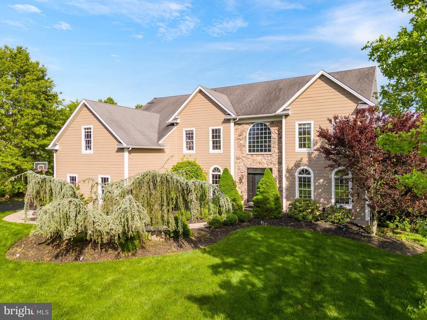 Welcome to 382 Summerfield Ct, Ambler, PA, where luxury living meets tranquility! This remarkable single-family home in a serene cul-de-sac presents an impressive 4425 square feet of living space, featuring 4 bedrooms and 3.5 bathrooms. From the moment you step inside, you'll be captivated by the grandeur of high ceilings and the warmth of natural light streaming through expansive windows, creating an atmosphere of comfort and sophistication. 

The main level boasts a meticulously designed layout with exquisite architectural details, including graceful crown moldings. Hardwood floors grace the entire level, except for the kitchen area, which features sleek ceramic tile flooring. The centerpiece of the home is the magnificent two-story family room, adorned with a striking floor-to-ceiling stone fireplace, providing the perfect setting for intimate gatherings and cozy evenings spent with loved ones. 

Prepare to be dazzled by the gourmet kitchen, a haven for culinary enthusiasts. Complete with state-of-the-art appliances and recessed lighting, this culinary oasis combines style with functionality, providing an inviting space to unleash your creativity. The adjacent all-glass morning room bathes in sunlight, inviting the outdoors in, with French doors leading to an expansive deck overlooking a fenced in backyard with lush greenery and majestic trees, ensuring privacy and tranquility. 

Ascending to the second level, you'll uncover tranquility and luxury within the sumptuous bedrooms, highlighted by the opulent primary suite. Designed as a serene retreat from the everyday bustle, the primary suite indulges with a private bath featuring a lavish glass shower and dual walk-in closets. Furthermore, this exquisite suite offers the added convenience of two separate rooms, ideally suited for a home office and a cozy sitting area. 

Complementing the primary suite, two additional bedrooms are adjoined by a convenient Jack and Jill bathroom, providing comfort and functionality for family or guests. A further bedroom across from a hallway bathroom completes this level, ensuring ample space and privacy for all occupants. 

The walk-out lower level of the home offers an additional 1450 square feet of living space, including a media room, a bedroom with an ensuite full bathroom, and a versatile room that can serve as an exercise room or an additional bedroom. Step outside to your private oasis, where there is a patio to indulge in a barbecue with family and friends, and a heated pool and spa to enjoy the beauty of the soothing sounds of nature. Schedule a viewing today and make this exquisite residence your own!