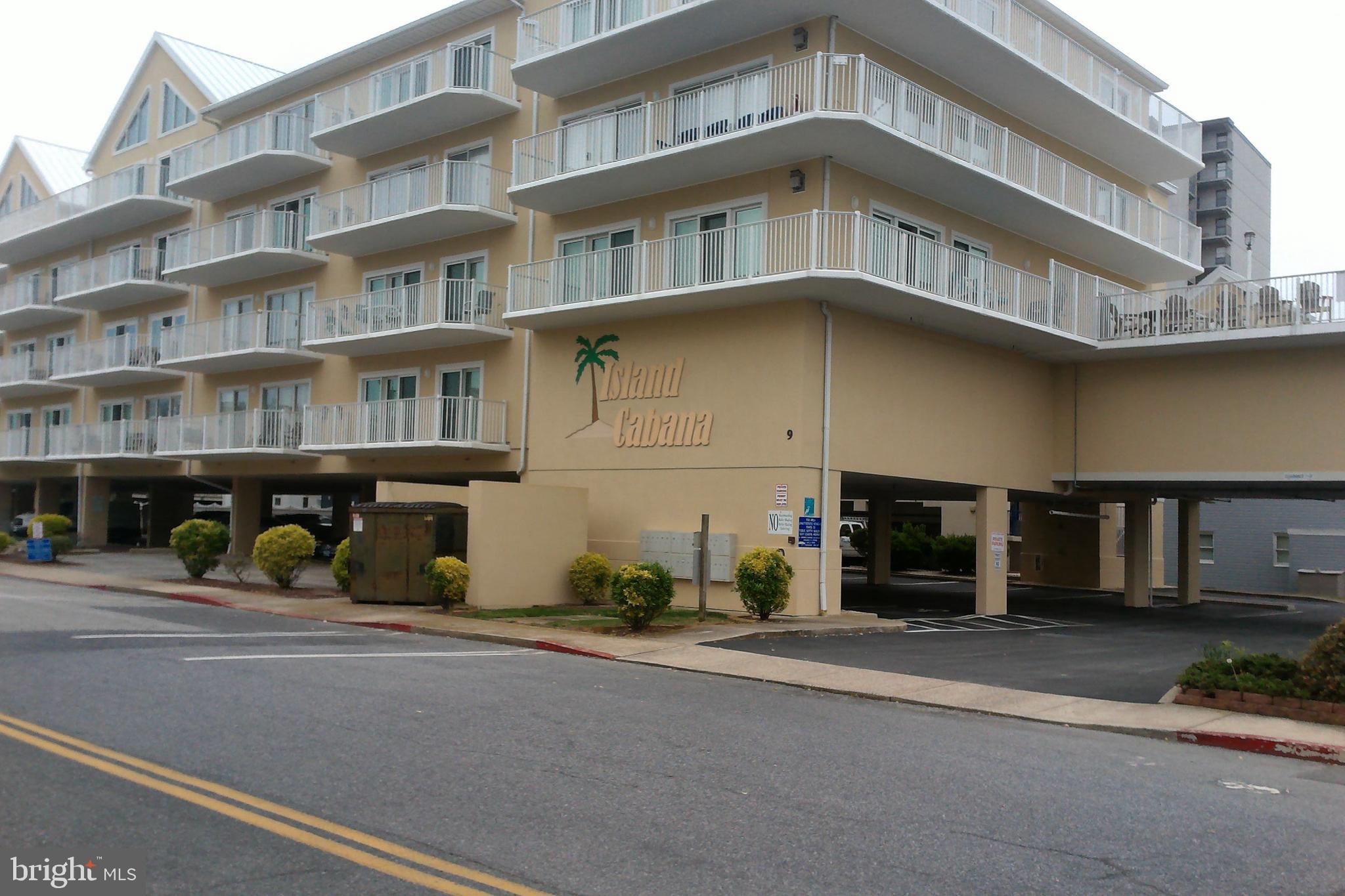 This Ocean Side Beach condo has it all: Views, Space and Style! This beautiful condo is the largest in the building with over 1400 square feet. The interior displays the beach theme throughout with the warm colors of pale blues, yellows and white. The open floor plan boasts an electric fireplace, extra-large living room, dining room with a table that will seat the whole family and a kitchen with a breakfast bar that is great for entertaining and family gatherings. Sit on your teak furniture while you enjoy views of the ocean and bay from your oversized balcony which is accessible from the living room and the master bedroom. The Master Bedroom has a King Size bed, a walk-in closet and a private master bath. Both guest bedrooms are beautifully furnished, and one has a built in trundle bed providing plenty of sleeping space to accommodate many guests comfortably. The kitchen is fully equipped with items even for a gourmet cook. There is a custom built corner cabinet located across from the kitchen. New refrigerator, dishwasher, dryer, HVAC and sliding doors to balcony. Owner's storage closet for all your beach items located on the 1st floor. Elevated pool located on the 2nd floor. Great mid-town location within walking distance to restaurants and shopping. Rental income 2018 $25,715, 2019 $28,550, and 2020 $11,980 with owner holds. Must honor rentals for 2021. Cable included in condo fee. No other unit in the building compares to #205. Do not miss this opportunity to own this lovely condo and enjoy all that Ocean City has to offer.
