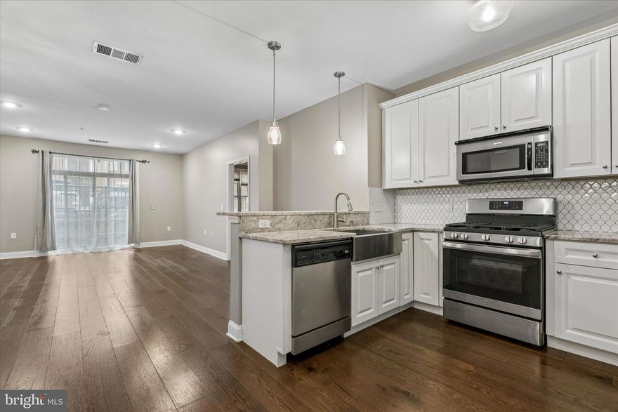 Welcome to luxury, low-maintenance living at The Grande at Riverview in Conshohocken. This beautifully updated one-floor condo offers comfort, convenience, and access to fantastic community amenities.

This unit was fully renovated in 2019 and features modern updates throughout, including hardwood flooring, fresh paint, and kitchen with granite countertops, white shaker cabinets, and a stainless steel farmhouse sink. The primary bathroom is spa-like, showcasing a frameless glass walk-in shower with rainfall shower head, dual vanity sinks, and custom cabinetry with granite countertops. A washer and dryer in the unit add everyday convenience.

Residents enjoy covered parking and resort-style amenities, including an in-ground outdoor pool, barbecue area, and fitness center. Located directly along the Schuylkill River Trail, it’s perfect for walking, biking, jogging, or relaxing strolls with your dog.

Commuting is simple with the nearby Conshohocken train station, providing easy access to and from Philadelphia. With luxury amenities, modern finishes, and a prime location, this condo offers the ideal blend of comfort, lifestyle, and convenience.