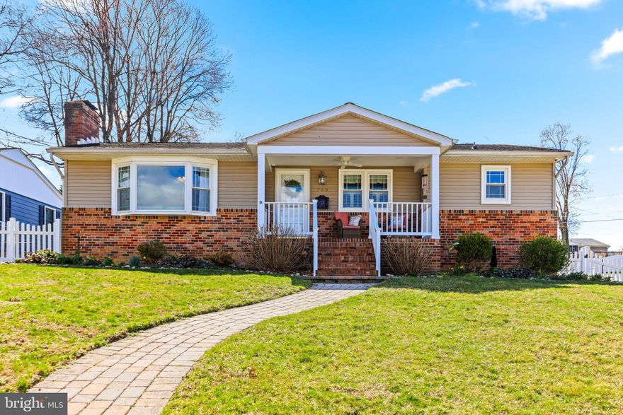Charming and versatile, this 3-bedroom, 1.5-bath home sits proudly on a spacious 0.26-acre corner lot in Linthicum's most desirable location. Offering both character and functionality, 763 Hawthorne is perched on a gentle hill, where the inviting front porch provides a peaceful retreat, perfect for morning coffee or relaxing evenings.

Inside, you’ll find warm hardwood floors and a cozy fireplace that create a welcoming atmosphere throughout the main living spaces. The kitchen is thoughtfully designed with granite countertops, stainless steel appliances and a double wall oven- ideal for cooking and entertaining. Both the kitchen and bedrooms are all adorned with plantation shutters adding an extra touch of detail to this charming home.

The fully finished basement expands your living options with a generous second living area, plus two additional bonus bedrooms and a dedicated office - perfect for guests, remote work, or hobbies like a home gym.

Outside, a classic white picket fence frames the property, adding timeless curb appeal and charm. With its flexible layout, spacious lot, and inviting details, this home offers comfort, character, and room to grow.
