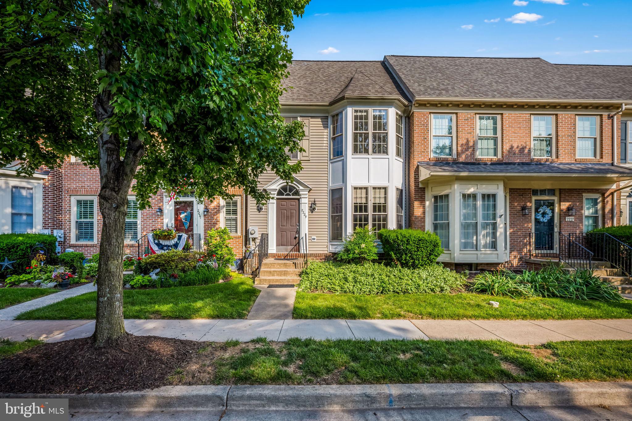 A Place to Call Your Own – 2229 Village Square Rd
Welcome to 2229 Village Square Rd, a charming townhome in the sought-after Worman’s Mill community in Frederick, MD. Full of natural light, character, and timeless features, this home is ready for your personal touch.The main level boasts gorgeous teak hardwood floors, a sunny bay window, curved archways, and a mirrored dining wall that adds elegance and depth. The bright eat-in kitchen features stainless steel appliances and opens to the backyard and detached two-car garage—perfect for easy everyday living. Upstairs, you’ll find three bedrooms, including the primary suite with another bay window, two closets, and a private bath with both a soaking tub and shower. Upper-level laundry hookups add extra convenience. The finished lower level offers a rec space, fourth bedroom, walk-in closet, and full bath. While the home needs a bit of TLC, it offers a classic design and an unbeatable location—just across from the Worman’s Mill pool, walking distance to neighborhood shops and restaurants, and close to downtown Frederick and commuter routes
This is more than a home—it’s an opportunity. Come see what makes 2229 Village Square Rd such a special place to live.