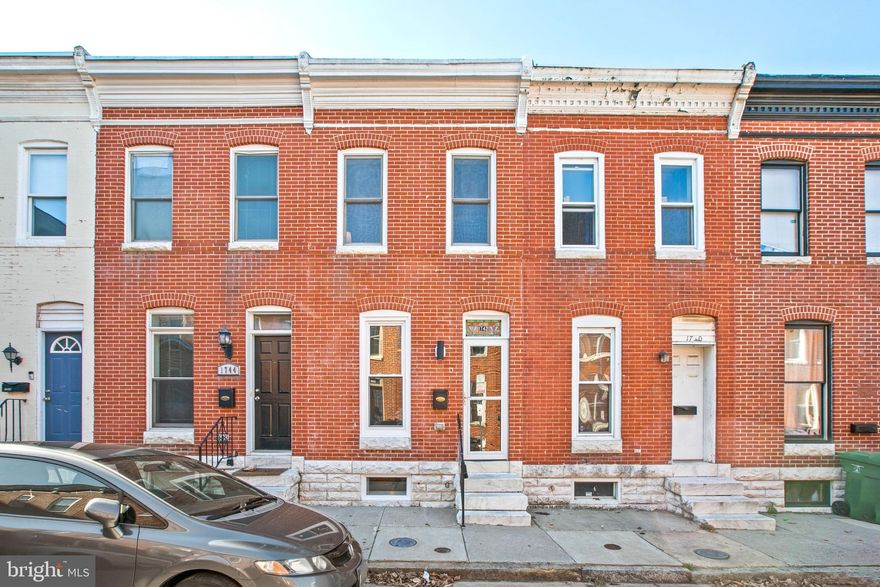 Gorgeous CHAP Rowhome with parking and Rooftop deck.  Walk in the front door to the generous living/dining room.  Walk past the half bath and coat closet to the kitchen with brand new stainless steel appliances. Upstairs you have the master bedroom with light up tray ceiling and a large closet and ensuite.  The second bedroom also has its own full bathroom adjacent in the hallway.  Upstairs laundry for your convience.  Hallway access to the massive rooftop deck!  Downstairs you have a large bedroom with huge full bathroom and storage/utility room.  Never worry about parking again with your private parking pad.  2021 Updates include: luxury vinyl flooring, paint and carpet throughout, kitchen appliances, washer/dryer and toilets.  Over a year left of the CHAP tax credit to save thousands!