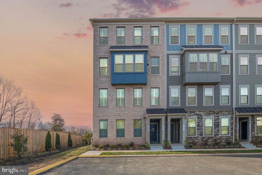 Commuters Dream!  End unit garage-condo near the VRE! Leave your car at home in your garage as the Manassas Park VRE Station is minutes away making your commute to Washington D.C. a breeze. This condo, built in 2023, is ideally situated in the Village at Manassas Park, surrounded by upcoming shopping, dining, entertainment, and outdoor activities. Enjoy the large open-concept main floor as the condo has three large front windows allowing natural light to flood the space. The quartz countertop peninsula provides seating for 5 and plenty of space to lay out appetizers or have quick meals while you’re working from home. Upstairs, the oversized master suite has an en-suite bathroom, double vanities, two walk-in closets, and a private water closet. The upstairs also has two additional bedrooms and a hall bathroom. This low-maintenance residence boasts modern finishes, plenty of windows, and lighting.  Don't miss out on this fantastic opportunity!