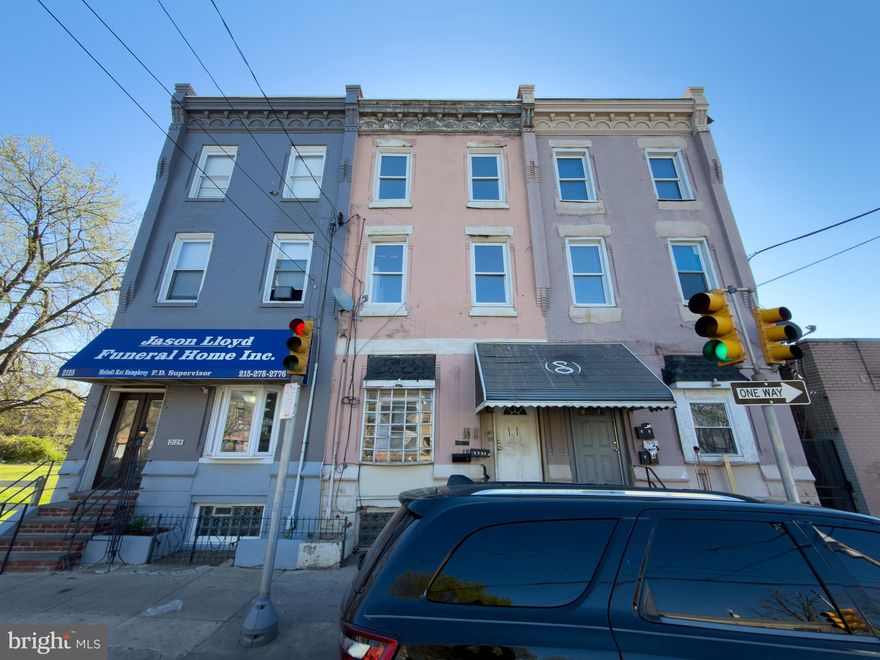 Situated just blocks from Temple University, this three-story CMX2-zoned property offers over 2,000 square feet and is configured as a four-unit building. The first and third floors each feature one-bedroom units, while the second floor is divided into two efficiencies. While the property needs renovation throughout, it presents a strong opportunity for investors seeking a fix-and-flip project or an addition to a rental portfolio in a rapidly developing area.