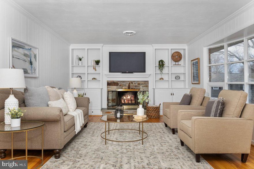 ***Offer Deadline Friday 2/17 at 9pm***LOVE WHERE YOU LIVE!!! Pines on the Severn has it all!!! A very active community with a beach, swim up platform, BBQ and picnic area, boat slips, boat ramp, moorings, pavilion, playground, basketball & tennis/pickleball courts, along with the Chase Creek community pool... what more could you ask for!! A perfect time to settle in for the upcoming Spring/Summer season in this lovingly cared for sprawling brick rancher with over 2500 square feet*The home is situated on a premium corner lot at the end of the street with little to no traffic*The light filled interior offers original hardwood flooring throughout, a generous size living room with large bay window and fireplace with built-ins on either side*The updated kitchen offers granite counters, abundant 42" cabinetry with soft close drawers, island, cooktop, wall oven, built-in microwave, pantry, under counter lighting, recessed lighting  and breakfast nook*The spacious primary bedroom includes a five piece en suite and large bay window with views of the rear gardens*There are also two additional bedrooms and sitting room/office area*The rear addition adds a wonderful family room with vaulted ceilings, wall of windows and glass door opening to a private paver patio with retractable awning***The entire interior has been freshly painted and is Move-in Ready***This home has been extremely well maintained and it certainly shines through in every room***Numerous closets and two exterior sheds are here for all your storage needs***Hit the B&A trail for a run, bike ride or leisurely stroll located just around the corner***Minutes to downtown Annapolis***