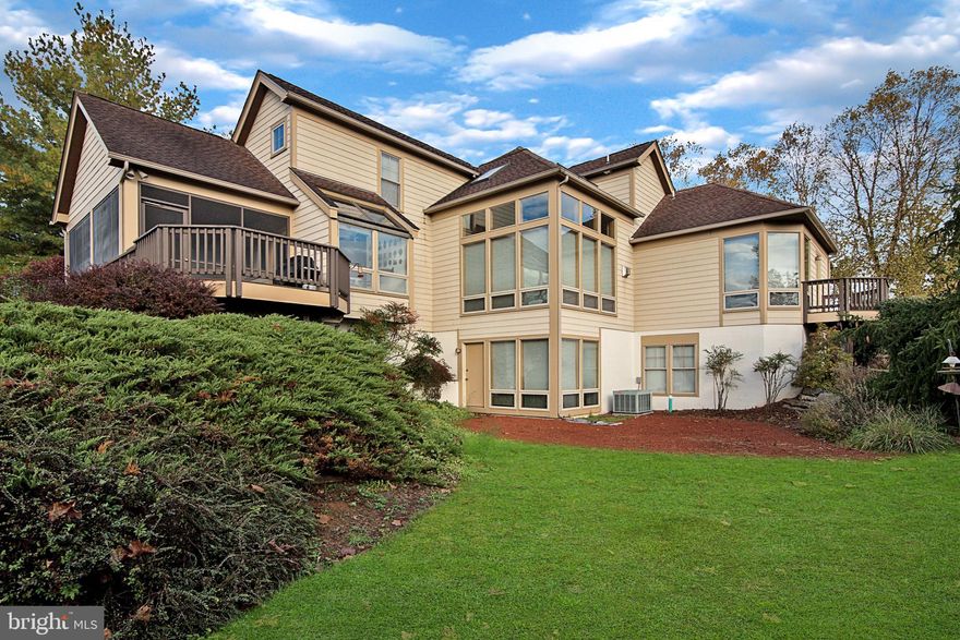 Beautiful craftsmanship  with Acorn package home built  by premier Shepherdstown builder, Michael Taylor.  Open floor plan and a master suite on the first floor! Incredible lot is surrounded  by mature landscaping for a very private setting...yet, the golf course surrounds it!  This is a premium lot showcasing this as the only house  on the cul de sac!  4 bedrooms and 4.5 baths gives you over 4000  sq. ft. of finished living.  High ceilings and wood beams are highlighted throughout!  Stone fireplace soars two stories. Glass windows throughout are mostly floor to ceiling.   Hardiplank siding and architectual shingles  show the quality construction.  Sunny breakfast area, lots of decks and a wonderful screen porch to enjoy the views! Contemporaries are rare and this one won't last, especially on this lot!