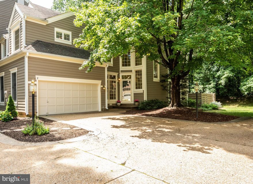 THIS WON'T LAST! Fabulous End-Unit Townhome  located in one of North Reston's most sought-after neighborhoods. Enjoy privacy and serenity in this premium cul-de-sac location. Natural light floods throughout and the open, airy floor plan makes entertaining effortless. RARE Miller & Smith design features Garage to Foyer entry on MAIN LEVEL. Relax in the stunning 2-story Living Room with gleaming hardwood flooring, fireplace and plantation shutters. Step out to a private, fully-fenced rear patio. Eat-in Kitchen features updated appliances, pantry and Laundry; Spacious Dining Room appointed with hardwood floors and plantation shutters. The UPPER LEVEL features an expansive Master Suite with hardwood flooring, vaulted ceilings, walk-in closet and an updated Master Bath with dual sinks, soaking tub and separate shower.  The large 2nd Bedroom features hardwood flooring plus an updated EN-SUITE Full Bath. The finished LOWER LEVEL features a large Rec Room with built-ins, wet bar with wine cooler, Bonus Room with built-ins, AND a full Office with custom built-ins. SIMPLY UNBEATABLE LOCATION! Just minutes to major shopping and restaurants, pools and tennis, miles of trails, Reston Town Center, Silver Line Metro, Dulles Tech Corridor and Dulles Airport. WONDERFUL AMENITIES: Reston offers 15 Swimming Pools, 52 Tennis Courts, 55 miles of Paths & Trails, 4 Lakes, 3 Ponds, 20 miles of Streams, many Playgrounds, Garden Plots, Picnic & Community Facilities that provide year-round opportunities for fitness, fun and exploration as well as top notch programs and events for residents of all ages.