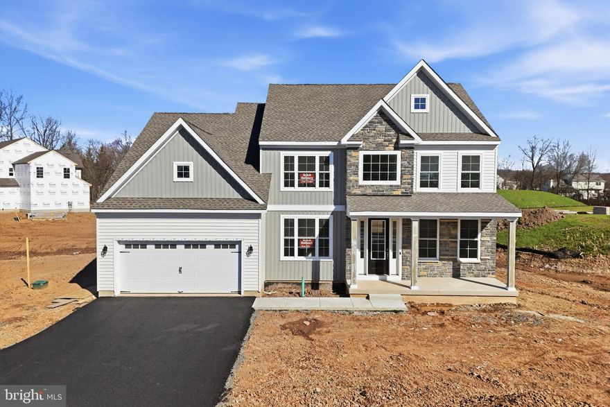 Welcome to Green Ridge Estates West by Sal Lapio Homes — where comfort, style, and convenience come together. This private enclave of just eight luxury homes is nestled in a quiet cul-de-sac. Featured here is the Worthington floor plan, a thoughtfully designed home offering 4 bedrooms, 2.5 baths, 2-car garage, and a truly open-concept layout that caters to today’s modern lifestyle. Step inside to a dramatic two-story foyer, flanked by a flex room and dining room. The spacious family room, complete an abundance of windows, is the perfect space for relaxation and gathering. Sliding doors lead you to the backyard, filling the space with natural light. At the heart of the home lies a chef’s kitchen, featuring a center island, stainless steel appliances, and plenty of cabinetry and counter space for today’s lifestyle. The walk-in pantry offers ample storage, while the adjoining breakfast area provides plenty of room for casual dining. A custom mudroom with bench seating offers a convenient drop zone just off the garage entry. Head upstairs where a large picture window on the landing brings in even more natural lighting. The primary suite is a true retreat, boasting a tray ceiling and two walk in closets. The luxurious ensuite bathroom features dual vanities with granite countertops, walk-in shower, and tile flooring. Also, on this level there are three generously sized bedrooms, a full hall bath, and a convenient second floor laundry room. The unfinished basement is a blank canvas—ideal for creating a home gym, media room, play area, or entertainment zone. Located just minutes from quaint Perkasie Borough, Sellersville and close to outdoor recreation at Lake Nockamixon and Peace Valley Park. Green Ridge Estates West offers the best of Bucks County living. Schedule your appointment today and discover why Green Ridge Estates West is the perfect place to call home. {NOTE: Quick delivery home- move in by Spring 2026!]