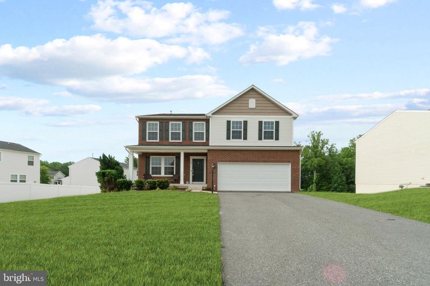 Beautiful 4 bedroom, 2.5 bath single family home in the friendly neighborhood of Stafford Lakes Village. ONE OWNER!! This home features a spectacular water view of Lake Mooney, a 570 acres lake with a boat ramp, stocked with fish, all in your backyard! Great curb appeal, beautiful front porch, two-car garage and extended driveway perfect for family and friends to visit. Enter into the spacious foyer with a generous sized flex space that can be used as a formal dining area or office. Open-concept main floor with kitchen/dining area that features maple wood cabinetry, granite countertops, and center kitchen island with seating. Off the dining room, the sunroom welcomes you to use it as a working space or an additional space for lounging or relaxation. Naturally bright with an abundance of windows and recessed lighting throughout the main floor. Additional room on the main floor has a closet and could easily be converted to a MAIN FLOOR BEDROOM, secondary office space or workout room! Entry from the 2-car garage leads to a mudroom space hidden from the rest of the open area. Great size laundry room located on the bedroom level for added convenience. The spacious owner’s suite has a private sitting room and large walk-in closet. The master bath offers double sinks, a large stand-up shower and soaker tub. The rest of the upstairs is just as magical, with 3 spacious bedrooms, all with large closets and ceiling fans, and a spacious bathroom with a double vanity. The walk-out basement is unfinished with rough-in to add a full bath, and large enough for a separate rec room, bedroom, and entertainment spaces. Massive backyard, perfect for your 2-legged and 4-legged babies to run free! You can enjoy this peaceful, family-friendly community known for its beautiful lake, with many amenities including a community pool, clubhouse, tennis and basketball courts, and plenty of parking! Conveniently located off I-95, and 1 Exit from Central Park and Spotsylvania Mall! Only a short distance to shopping, restaurants, the VRE, Mary Washington Hospital and Commuter lot on HWY 17 approximately 1/4 mile from I-95. Your new keys and lifestyle are waiting for you!