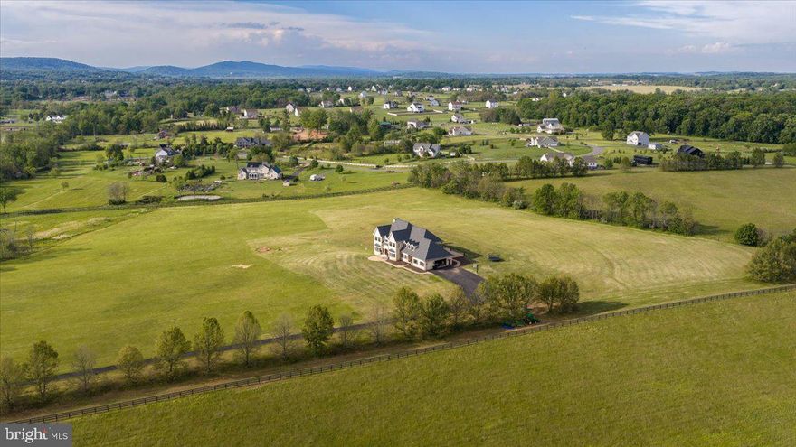 Opportunities like this are almost never available. With over $700,000 in meticulous renovations, sweeping mountain views, and 36+ acres of equestrian‑ready land, this Lee’s Crossing estate stands out as one of the most exceptional turnkey properties in the Leesburg market. Recently appraised and listed below appraised value, this property presents an extraordinary opportunity to own a fully renovated luxury estate with immediate equity potential.

From the moment you arrive, the setting feels extraordinary. A peaceful creek frames the front of the property, while 180+ degree views of multiple mountain ranges surround the home from every side. Wildlife, open sky, and rolling acreage create a sense of privacy and natural beauty that is nearly impossible to replicate—especially less than 10 miles from downtown Leesburg and the Leesburg Premium Outlets.

Inside and out, the home has been comprehensively rebuilt for long‑term luxury living. Major structural upgrades, premium exterior materials, new mechanical systems, and fully renovated interiors mean the next owner steps into a residence that feels brand‑new—without the cost, delays, or uncertainty of undertaking a large‑scale renovation themselves.

The upper level features four oversized bedrooms, each designed with expansive walk-in closets and generously sized full bathrooms, creating a true luxury retreat for family members and guests alike. The primary suite is a private sanctuary featuring a massive walk-in closet and an oversized spa-like bathroom complete with a oversized jacuzzi, separate shower, and dual his-and-her vanities. The suite also opens to a private balcony overlooking the breathtaking mountain views and scenic landscape surrounding the property..

For equestrian buyers, this property is a standout. The acreage has been thoughtfully prepared for pasture, riding, and future facilities, and the estate includes plans for a custom equestrian barn. Even more rare, the community and surrounding land offer direct equestrian ride‑out opportunities, giving riders access to scenic trails right from the property—no trailering required.

And for those dreaming of a resort‑style outdoor retreat, the estate also includes completed plans for an in‑ground pool, allowing the next owner to create a luxury oasis that matches the scale and beauty of the land.

This is more than a home—it’s a fully realized vision. A rare combination of high‑end renovations, breathtaking views, prime location, ride‑out trail access, and true equestrian potential. Properties with this level of investment, acreage, and turnkey readiness almost never come to market in Loudoun County.

For the buyer seeking a luxury estate that delivers immediate comfort, long‑term value, and endless possibilities, this is the one.