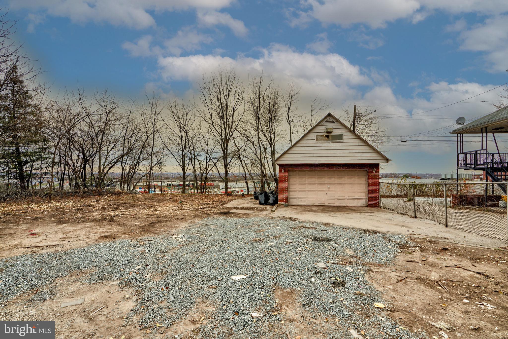 2 car garage or storage opportunity located close to Home Depot and major road- ways. The lot is 0.20 ac. There is electric however, buyer to verify condition. No water or sewer. The upper area offers additional storage, total building is 540 sf-est. Zoning is residential, buyer to verify potential usage.