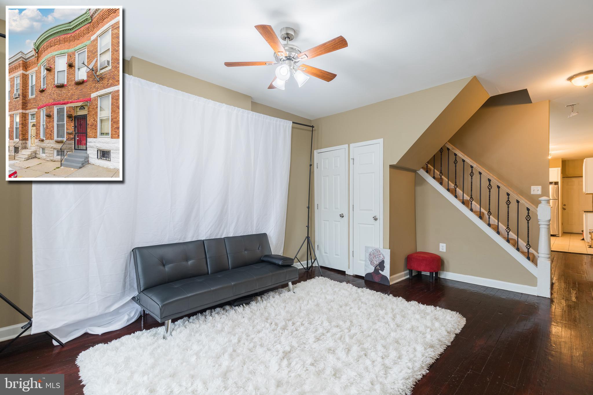 PICTURE PERFECT MOVE-IN READY ROWHOME WITH DESIGNER KITCHEN! Spacious living room and separate dining room w/ hardwood floors, Chef's kitchen w/ granite counters & ss appliances, main level half bath, upper level w/ 3 generously sized bedrooms & 1 full bath, full basement w/ laundry area, and rear patio! Newer plumbing, electrical, roof, & windows. Pack your bags and move right in!