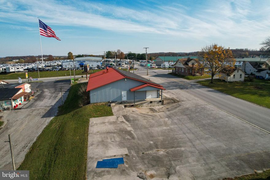 2145 Baltimore Street offers a versatile commercial-industrial opportunity in a highly visible Hanover location. Situated on a signalized intersection with approximately 13,000 vehicles per day, the property provides excellent exposure and accessibility for a wide range of users.

The building features flexible zoning and a functional layout suitable for light industrial, service, warehouse, or mixed commercial applications. A solar energy system conveys with the property, offering long-term operational cost savings and sustainability benefits.

The expansive lot provides room for future building expansion, outdoor storage, or additional parking, making the site well-suited for businesses with growth plans or operational flexibility needs. With strong frontage, infrastructure in place, and favorable zoning, 2145 Baltimore Street represents a compelling opportunity in the Hanover market.