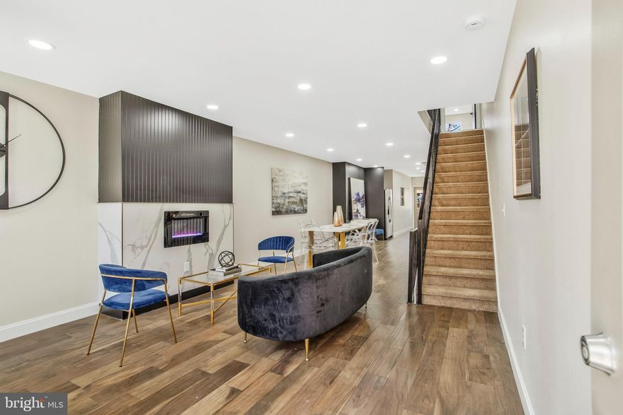 Fall in Love with Your New Home! Washington DC style home in the heart of Baltimore! Be a part of Historic Franklin Square's Urban Renaissance Revitalization before other homes in the area complete.

Luxury finishes can be seen throughout the home which is on trend and timeless at the same time.  This spacious modern-style home is welcoming from the entry into an open floor plan.  The cozy living room features a warm fireplace, which is open to a large formal dining room, and chef's kitchen, featuring quartz countertops, beautiful cabinet, modern shelving, stainless steel appliances, overlooking a fenced backyard. This unique home boasts 4 spacious bedrooms, 2 spa-like full bathrooms, beautiful railings throughout the home, and custom designed fixtures and features throughout.  Exotic wood floors throughout the home and modern black and gold features will make the owner feel like they are living in a model home. 

This Franklin Square gem qualifies for various grant opportunities such as Vacant-to-Value (up to $10k); SOWEBO (up to $10k); Live Near Your Work (up to $16k); CDBG (up to $5k); Live Baltimore (Trolley Tour) - Buying into Baltimore (up to $5k) in addition to Downpayment and Closing Cost assistance programs.   This the home you've been waiting for!