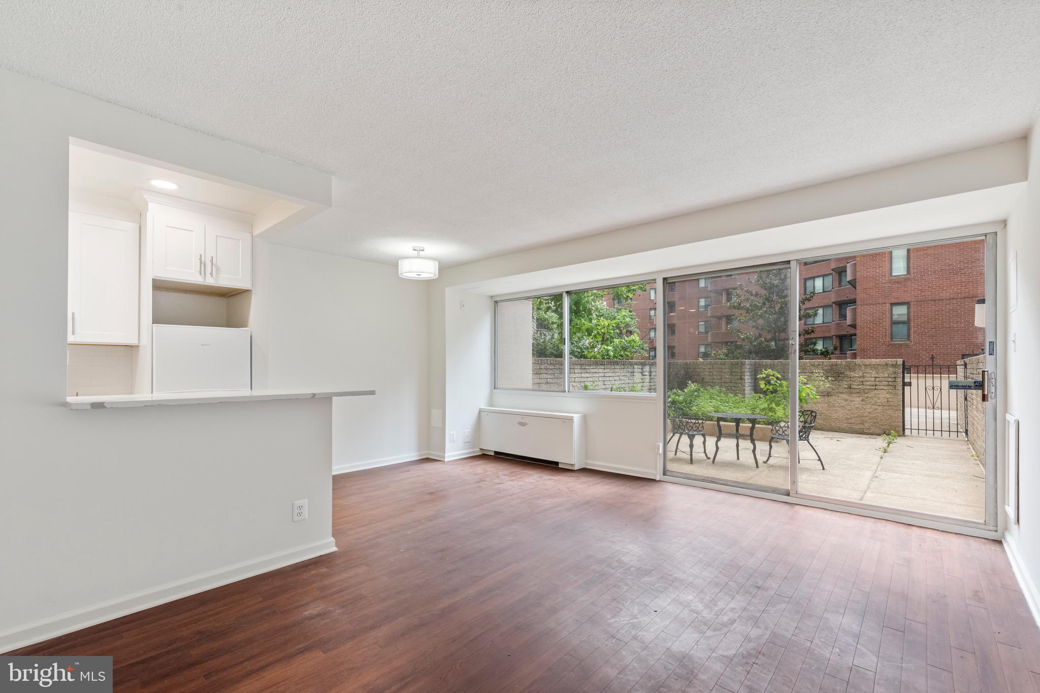 Bright and Spacious efficiency with large private terrace. Enjoy the Heart of Friendship Heights with this beautifully maintained one-bath condo at the Willoughby. Abundant natural light and a flexible layout ideal for comfortable living within walking distance to the Metro, Whole Foods as well as a plethora of dining and shopping. The open living and dining area flows seamlessly into a renovated kitchen with breakfast bar, while a wall of windows opens to a spacious private terrace with gated access. The full bathroom has been updated with clean, modern finishes. Located in the vibrant Friendship Heights neighborhood, The Willoughby is a full-service building offering 24/7 concierge, a rooftop deck with panoramic views, a fitness center, on-site market, library, and outdoor pool. Just steps from Metro, Whole Foods, high-end shopping, fine dining, and parks. Garage parking is availabe for rent in the building.