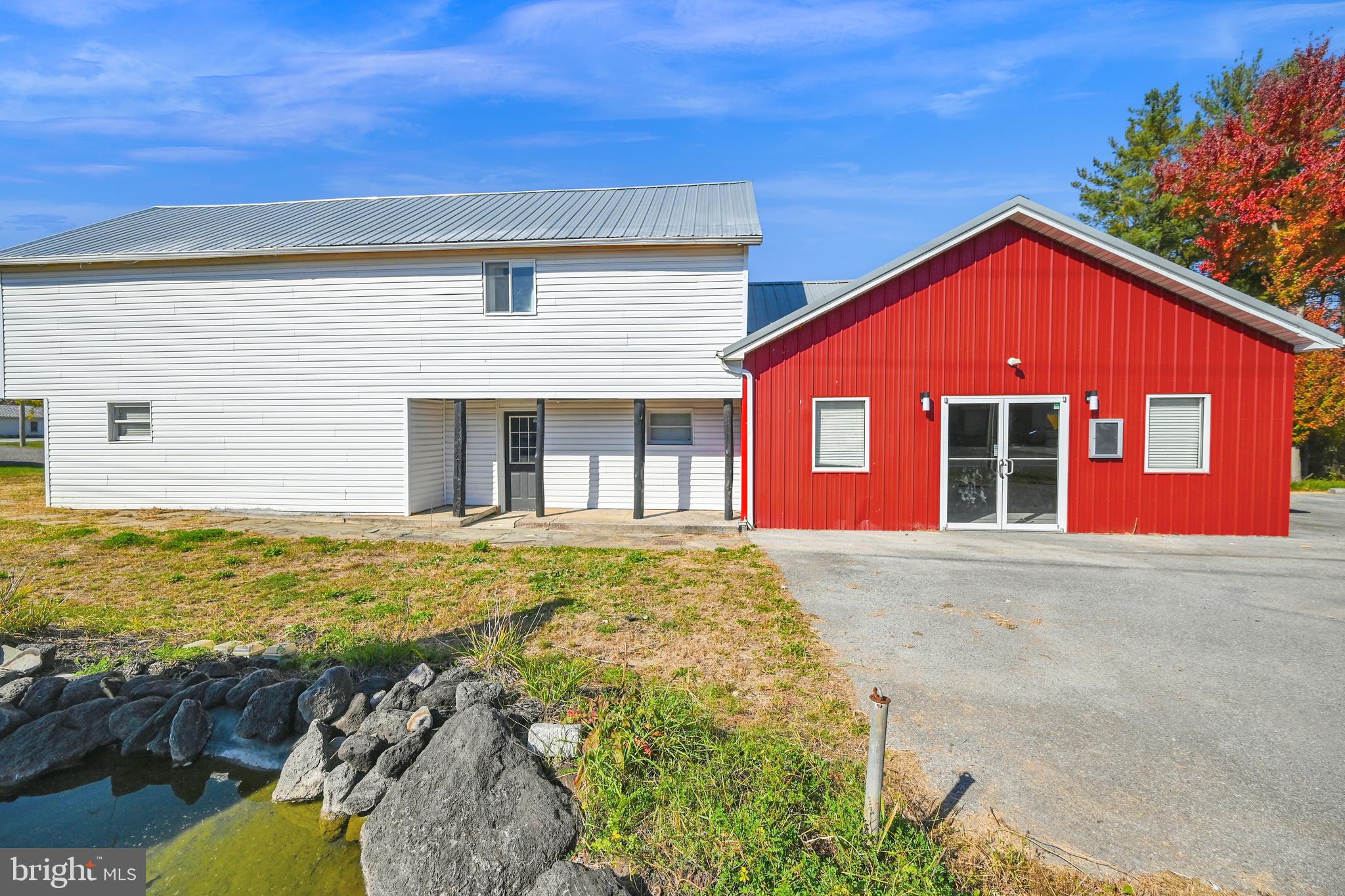 Many possibilities with this well maintained, mixed-used property sitting on 2.48 acres and conveniently located at the intersection of Route 30 and Granite Station Road, which offers lots of exposure. Zoned (EC-1) and Permitted for a wide variety of residential and commercial uses. Not only does this property offer a large commercial space equipped with electric, plumbing. It also offers a detached home w/ 3 bedrooms, 1 full bathroom that could be rented out or owner occupied. The house and commercial building have separate parking lots. Don’t miss out on a great opportunity.