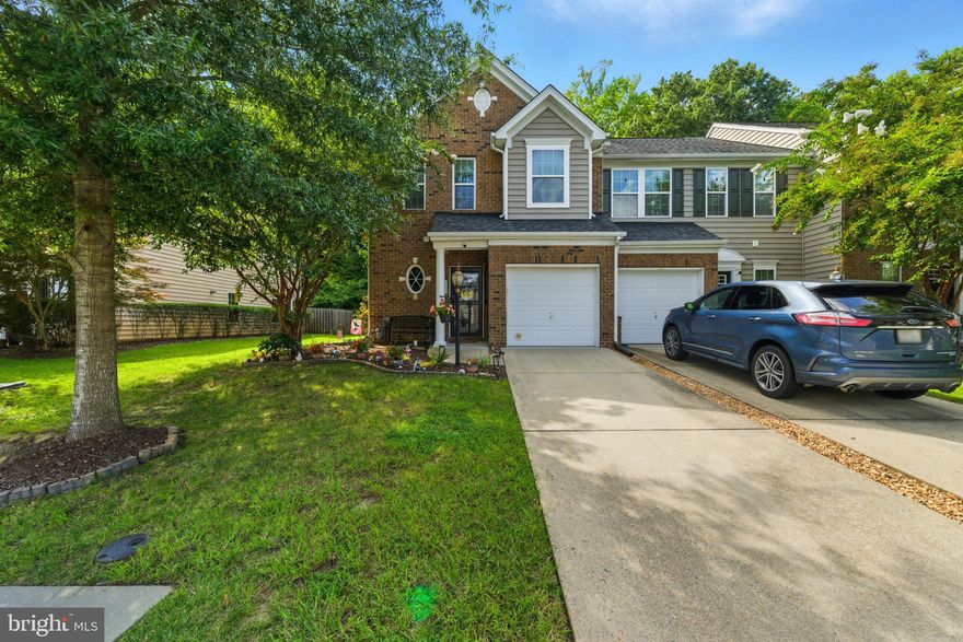 Welcome to Riverwalk Townes! This spacious end-unit townhome is move-in ready and energy-smart with fully paid-off solar panels—per seller, the average electric bill is under $10/month—and a new HVAC system (installed ≈4 months ago) for year-round comfort. The open-concept main level with hardwoods showcases a cook’s kitchen with sleek granite surfaces, a premium stainless suite (including a smart refrigerator), and a center island, flowing to the dining and living areas. A bright bonus room that lives like a sunroom adds versatile space; within it, an **efficient built-in planning desk/office nook—separate from the kitchen—**creates a tidy workspace. Smart-home convenience continues with an installed security system, and the attached garage provides extra storage.

Upstairs, the generous primary suite highlights a tray ceiling, two oversized closets, and an ensuite bath with a walk-in shower and separate tub, with the laundry room nearby; the additional bedrooms feature low-maintenance LVP. Outside, the fully fenced, private backyard shines—its patio and pergola create a truly unique retreat, and the property backs to a forest for added privacy. A home warranty transfers to the buyer for added peace of mind. Minutes to Yorktown Beach, dining, and shopping; community amenities include a clubhouse, pool, trash pickup, and grounds maintenance. Schedule your tour today!