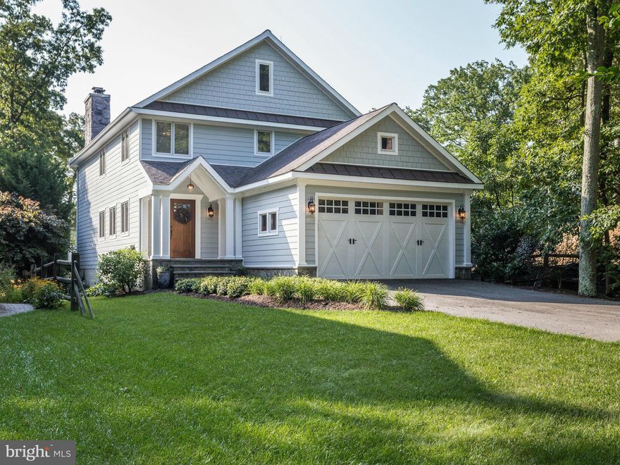 Resort living in your own backyard! The waterfront pool designed by Town Creek is stunning along with extensive landscaping,stone retaining walls,and sweeping views of the water. An open plan affords casual waterfront living and the two story stone fireplace in the great room provides the perfect focal point. SP schools and high end exterior finishes complete the package for this special offering.