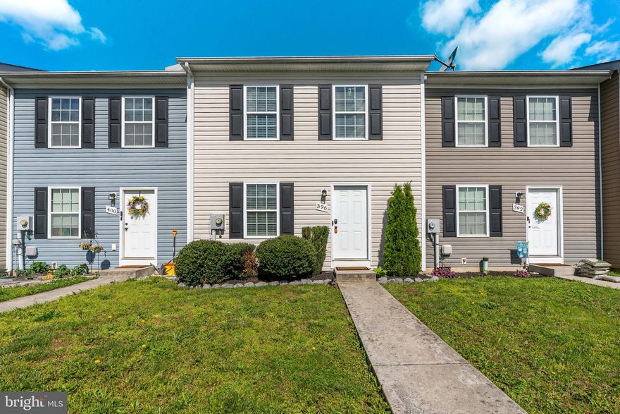 Welcome to 396 Dorothy Court, a beautifully updated3 bedroom townhouse located in Tabler Station Manor. The stunning kitchen features stainless steel appliances and modern finishes, perfect for any home chef. The spacious primary suite includes a custom full bath with an oversized walk-in shower.  Well maintained.   New Flooring and new HVAC,   Step outside to a lovely rear patio that backs to a peaceful tree line—ideal for relaxing or entertaining. . Conveniently located just minutes from I-81 and Procter & Gamble, this home offers both comfort and convenience in a growing area. Don't miss your chance to make it yours!