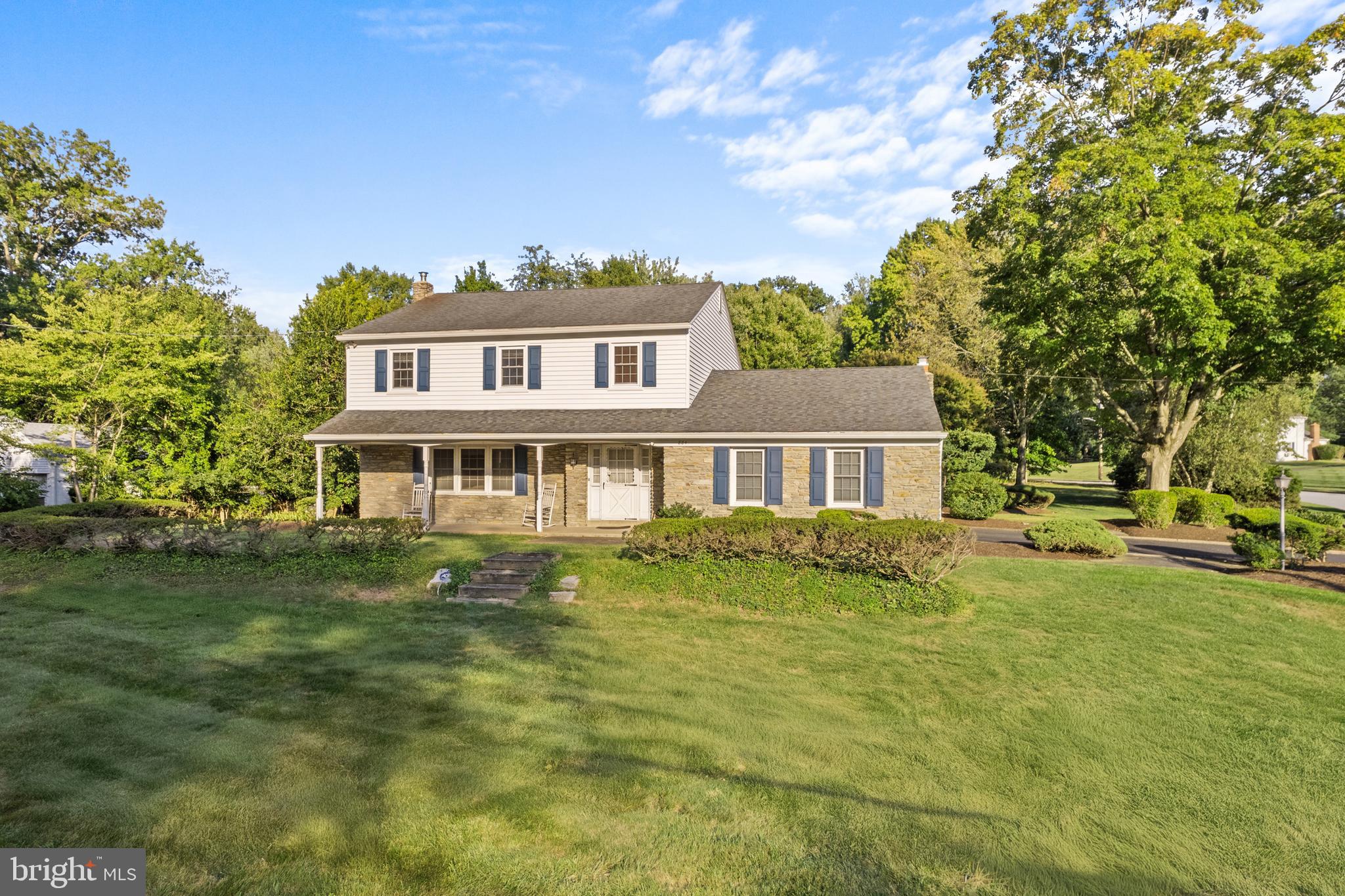 Plenty of space to live, laugh, and grow! Take a look at this newly listed home featuring a spacious, well-designed floor plan. This stone-front Colonial boasts a traditional layout with a welcoming front porch and a grand entrance foyer with a circular staircase. Enjoy formal living and dining rooms, a fireside family room, first-floor laundry, and a three-season sunroom. The updated kitchen includes new cabinetry, granite countertops, subway tile backsplash, pantry, and top-of-the-line GE Café and Bosch appliances. Upstairs, the second floor offers four generously sized bedrooms, an abundance of closet space (most are walk-in), and gleaming hardwood floors. Set on a parklike ¾+ acre lot, the backyard is a true retreat, complete with a saltwater pool—perfect for making memories with family and friends for years to come. Stately positioned as the "gatekeeper" to the Executive Estates neighborhood, this home reflects pride of ownership and has been lovingly maintained. Additional features include a whole-house generator, newer roof, low-maintenance vinyl siding, efficient gas hot water heating system, central air (with a split system added in the family room), fenced yard, and natural slate walkways. Located in the award-winning Upper Dublin School District and just minutes from major roadways, train stations, parks, shopping, and dining. Schedule a visit today and discover everything this home has to offer!