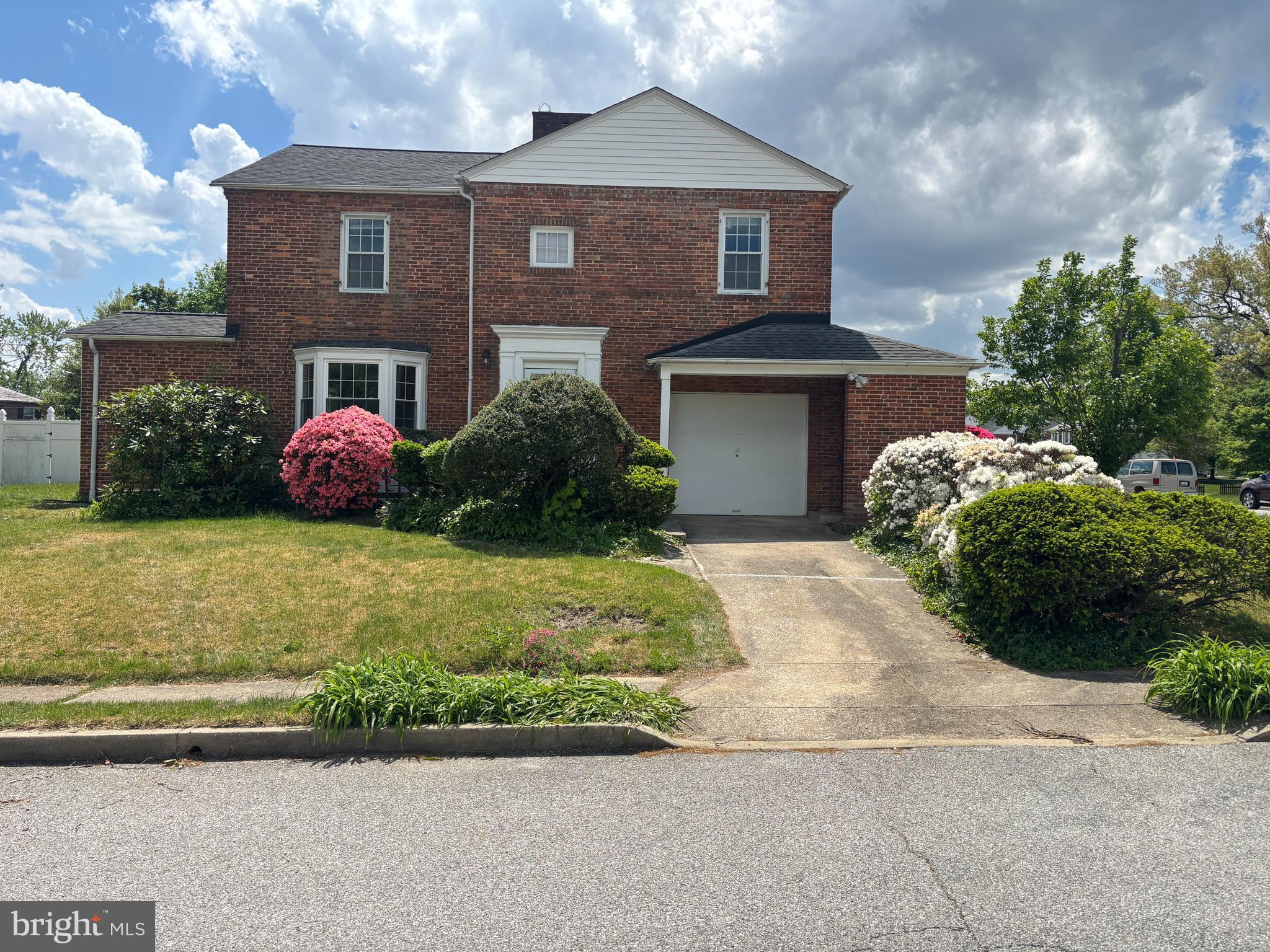***BUYER FINANCING FELL THRU- BACK ON MARKET!*** Welcome Home! To this beautiful 4 Bed / 2.5 Bath Townhome with a Garage! Gleaming hardwood floors showcase a huge living room that is open to the gourmet kitchen . The main level provides Large Bay Windows for Natural Sunlight. The garage has tons of extra storage space, and the full size driveway gives you a second parking spot. The home is beautifully landscaped. Don't miss this GEM!