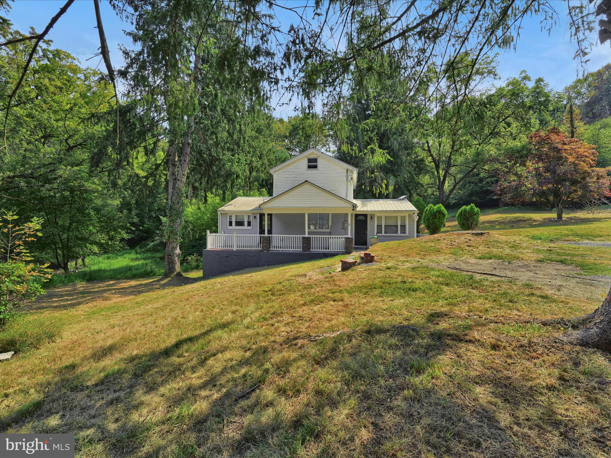 Recently renovated single home on 2.20 acres in Minersville Area School District, Cass Township! Inside the home, all on the main floor, you'll find the living room, dining room, eat-in kitchen, one bedroom, one full bathroom, and laundry. Upstairs is a large bedroom with tall ceilings and a loft area great for an office space, playroom, a 3rd walk-through bedroom, sitting area - bring your ideas! The home is fully renovated with everything replaced by the current owner in the past few years: new flooring throughout, new kitchen cabinetry and appliances, new bathroom, new windows, new heating and central air system, new shingle roof on rear basement portion of home. The home's main roof is metal. The large 2.20 acre lot speaks for itself! Perfect for enjoying the surrounding nature or entertaining. Plenty of driveway parking. This property is in close proximity to the district's schools and travel routes Rt. 901, Rt. 209, and I-81.