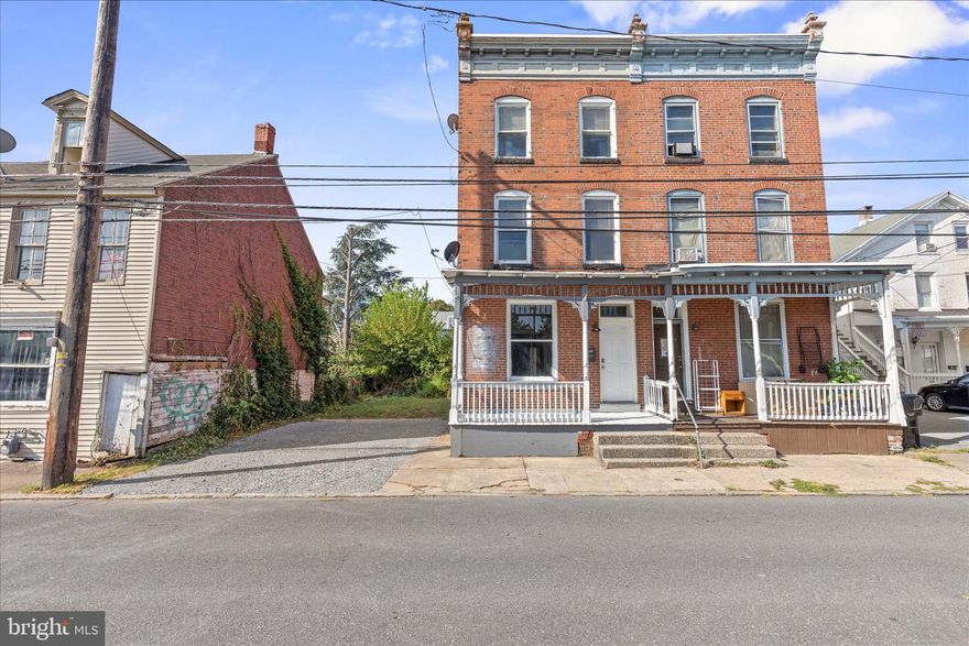 Move-in ready Midtown home with 4 bedrooms, 1.5 baths, and 1,872 sq ft of living space! Enjoy ample off-street parking plus multiple outdoor spaces including a front porch, back deck, balcony, and private backyard. Inside, you’ll find fresh paint and new flooring throughout, an updated kitchen, convenient first-floor laundry with a half bath, and a spacious primary bedroom. Full unfinished basement offers plenty of storage.  All this just steps from Midtown’s shops, dining, and amenities!