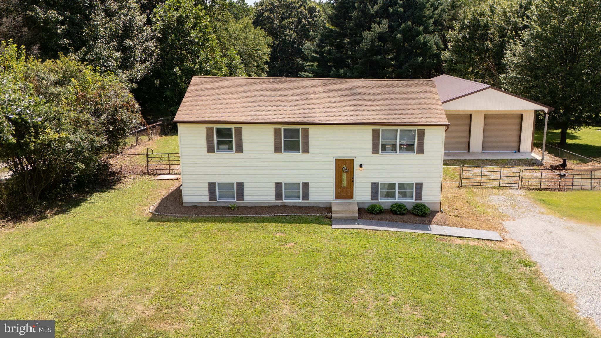 Welcome Home! The perfect starter home has arrived. Three bedrooms and one and a half bathrooms the home has plenty of space and room to grow. Partially finished basement with large rooms that could be office space, extra living room or play room the possibilities are endless. Large composite deck is easily accessed from the kitchen and over looks the large fenced in back yard. Fantastic sized back yard which is hard to find in this price range. Also a 30x40 sized garage with two overhead commercial entry doors and concrete floor ready for your projects to take place! HVAC has been replaced in the last 6 years along with roof in the last 15 years that is a 40 year shingle. Dont miss this opportunity to own this home priced to sell and is a one owner home built in 1988. Professional pictures will be uploaded by Thursday.