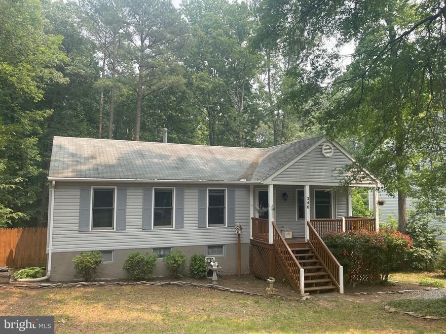 Buyers backed out, back on the market…Welcome! Let's talk about this wonderful rambler home located in a charming lake community. This adorable house offers three bedrooms and two bathrooms, providing ample room for you, freshly painted, new carpet & new hot water heater.. As you step through the front door, the family room with its cozy wood stove will greet you. The unfinished basement is a blank slate for the future renovations or projects that you have planned. The basement is a perfect space for a home office, entertainment room, or gym, and with your vision, it will become a fabulous space for you! When summertime rolls around, you and your family can enjoy bringing the party to the fenced backyard; you will have full privacy and relaxation without worrying about noise. The backyard is large enough to run and play as well as perfect for summer barbecues, enjoying the beautiful outdoors, and making wonderful memories. In the lake community, there are a plethora of amenities to take advantage of, such as swimming in the lake, fishing, boating, and exploring the neighborhood's lush natural beauty. So, don't wait - grab the chance of owning this amazing property today!