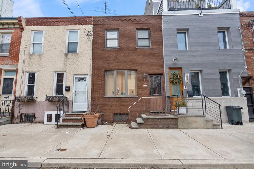 Well-maintained  Modern 3-Bedroom 1-Bath  Rowhome with Large Eat-in Kitchen , Full Basement, Newer Brick Front Facade, and Hardwood floors in Living room/dining area on Great Block in Passyunk Square Neighborhood right off of East Passyunk Ave.! A Must See!