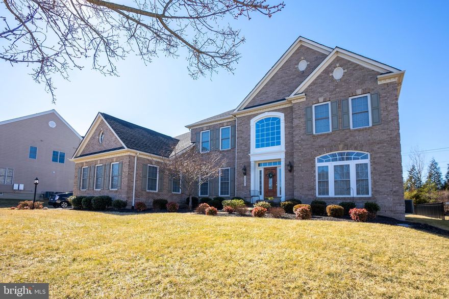 Welcome Home !  From the moment you walk through the front door, you'll know you've found something SPECIAL!! With over 6500 sq. feet on 3 finished levels, the HUGE 2-story foyer sets the stage for this beautiful home! To the right, you'll find a formal living room and to the left, a spacious dining room with tray ceiling, that is perfect for entertaining.  Retreat to your grand owner’s suite with a spacious sitting area, two walk-in closets and changing area along with a glamorous en-suite bath with dual vanities, jetted soaking tub and large shower. Each secondary bedroom is generously sized including a junior suite with private bath, two additional bedrooms with a Jack & Jill bathroom.  Brand New Carpet on the entire 3rd floor ! You will also find a sleek gourmet kitchen with huge island, under cabinet lighting, appliances and high end fixtures.  The LARGE fully finished basement hosts a full wet bar with fridge, dishwasher and gorgeous cabinets, a media room, exercise room, 5th bedroom with walk-in closet and en-suite full bath and last but not least an additional unfinished storage space.  Additional features include 2 staircases, a 3 car garage, a large patio, main level office, irrigation system and prewired audio system that plays inside and outside the home.    Look no further, your DREAM HOME awaits you !