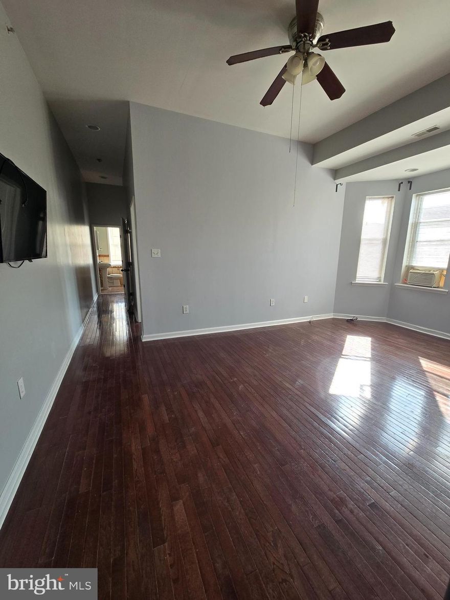 Discover the perfect blend of comfort and style in Unit #3, a spacious 2-bedroom, 1-bath apartment located in the heart of Temple University. With gleaming hardwood floors throughout, this unit offers a warm and inviting atmosphere that complements its modern layout. Each bedroom is generously sized, providing ample space for relaxation or productivity, while the well-appointed bathroom adds a touch of contemporary flair.

Situated in a vibrant neighborhood, this apartment is just steps away from local shops, dining, and public transportation, offering both convenience and a dynamic lifestyle. Whether you're a professional or student, this residence is ideal for anyone looking for a cozy yet stylish space to call home. All square footage numbers are approximate and should be verified by the buyer. It is the responsibility of the buyer to verify real estate taxes.