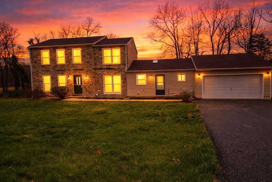 Imagine living right on the water: waking up to the sounds of birds, the sight of marsh grasses swaying in the wind, seeing the seasons change across the river, and watching Mother Nature paint the sky every night from your riverside back deck.  This could be your daily life should you decide to make 610 Country Club your home.  This lovely home features a very recent new roof, new carpet throughout, has been  recently painted and all you need to do is say yes to the address! The main level here hosts a full kitchen with an open-concept living and dining room.  Next is an adjoining room that also leads to a half bath and the laundry. Beyond this, you will find a fully equipped, potentially separate apartment.  This en suite or in-law suite includes a second kitchen with space for a small table, a living room, a full bath and a bedroom. This suite also connects to the garage or can be accessed through a separate front door.  On the upper level, four bedrooms and two full baths complete this amazing waterfront dwelling.  Make an appointment today to see it in person! This home sits on one lot and a second lot, to the left is included in the sale.