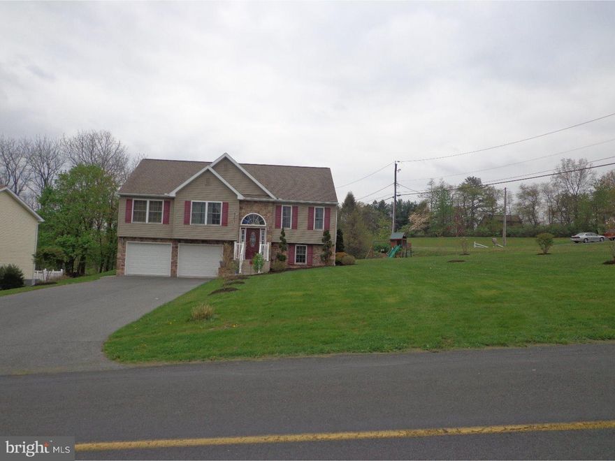 Open concept floor plan with vaulted ceilings, master suite, spacious family room with half bath, deck perfect for bbq's, great corner lot, shed, oversized 2 car garage, lots of storage space, Main Floor laundry, Eat In Kitchen with all appliances included.