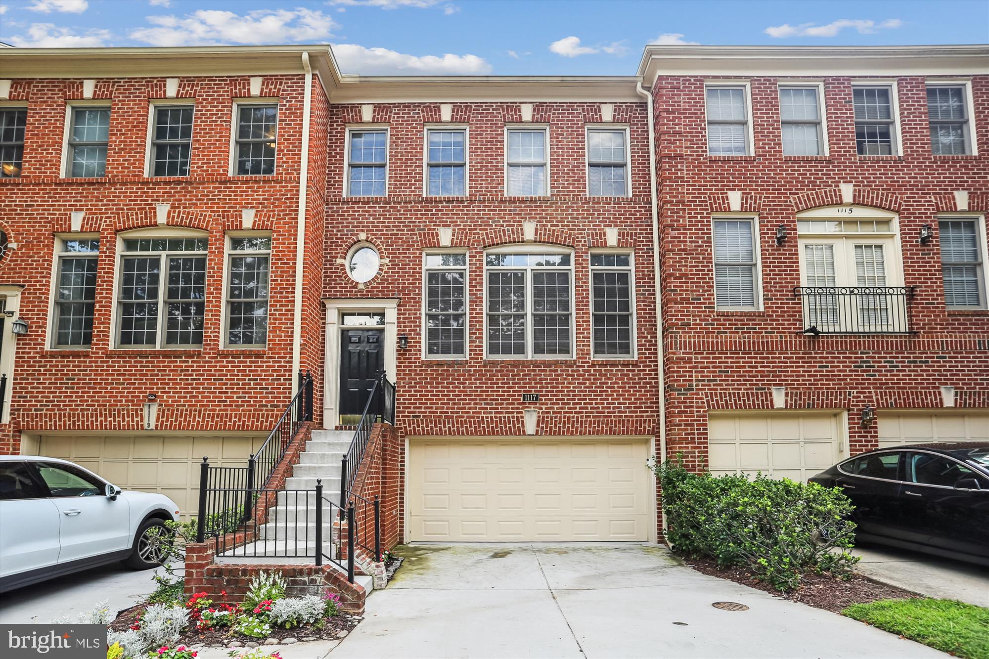 Nestled in the highly desirable Villages at Tower Oaks, this sun-drenched four-level townhouse offers 4 bedrooms and 3.5 baths across a thoughtfully designed layout. The main level showcases gleaming hardwood floors and an open-concept design, creating a welcoming space ideal for both everyday living and entertaining. The kitchen flows effortlessly onto a spacious deck, complete with elegant spiral stairs leading to a charming garden patio below. Upstairs, the primary suite features a generous en-suite bath with a double vanity, accompanied by two additional bedrooms and a full bath. The top level provides a private retreat with a fourth bedroom, full bath, and ample storage. Downstairs, the finished lower level is perfect for entertaining, featuring a Bose surround sound system and direct access to the serene back patio. The rec room leads to a laundry room with access to the two-car garage. Spacious storage areas with ample guest parking availability.
Located in the vibrant Tower Oaks neighborhood, this home places you just moments from acclaimed dining destinations like Glenwood and Clyde’s Tower Oaks Lodge, with Pike & Rose and Park Potomac also close by for shopping and entertainment.. Commuting is a seamless with easy access to Ride-On, Metro, and major routes including I-495, I-270, and MD 355. Outdoor enthusiasts will love being near Dogwood Park, perfect for jogging, biking, leisurely strolls, or simply enjoying nature.