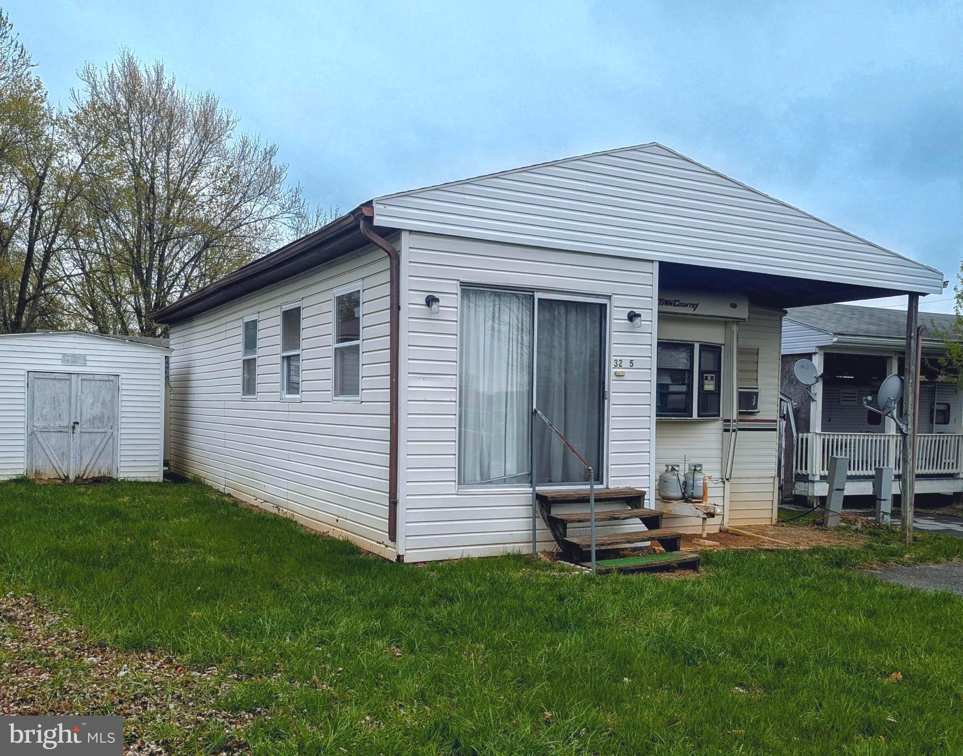***Property Details *** Great lot! Trailer is in need of some fixing but great lot to start your fun at Riverbend. Very spacious inside park model with addition it has a lot of potential to make your own. Lot has sewer hookup, no pump outs. **** Lets bring an offer to to table! ***BRING YOUR BEST OFFER*** YOU WON'T WANT TO MISS THIS ONE. This is a gated community so you need to enter at the guard shack. Entry is not permitted without ID per the office rules. Bring ID's to the office or guard shack for visitor pass. THIS IS A SEASONAL CAMPGROUND! OPEN FROM APRIL 1 TO NOVEMBER 1. ** WELCOME TO RIVER BEND/SEASONAL LOT AVAILABLE TURN KEY** River Bend is a privately owned 400 acre recreational- vehicle camp resort with seasonal activities for members, families and guests. This great RV park is tucked away on the Upper Potomac River of West Virginia, River Bend is one of West Virginia's most popular family seasonal destinations. . Just a short drive from the Washington and Baltimore metro area. Open with utilities from April 1 to November 1. Lot owners have access to their property the entire year. *** Members Enjoy *** * Amazing views and wildlife, Potomac River access, Trails, Swimming pools, Mini-Golf, Youth center, Tennis and basketball courts, laundry facilities, convenience store, deli and lounge. *Bath houses through out the park, boat ramp, bar and grill and even a church located on the grounds. River Bend also hosts numerous activities such as 4th of July fire works, small carnival, bonfires, poker runs, horse shoe tournaments, car show, Halloween Trick or Treat and so much more.