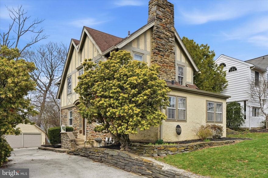 Discover timeless charm and modern comfort in this stunning single-family Tudor at 310 Old Forest Rd., nestled in the heart of Carroll Park section of Wynnewood, PA. From the moment you arrive, the character of this home shines through, while its thoughtfully updated features make it perfectly suited for today’s lifestyle.  The owner has done several upgrades to the home!  Step inside to find a fully updated luxury kitchen renovation that’s as functional as it is beautiful, featuring sleek quartzite countertops, beautiful shaker white cabinetry and all the amenities you could want in a gourmet kitchen. This space was opened up and is thoughtfully designed with a dining area, perfect for both casual breakfasts or hosting memorable formal gatherings. Whether it’s a quiet morning coffee or a lively dinner party, this space is the true heart of the home.  The home offers 3 spacious bedrooms, and for those dreaming of even more space, a large attic awaits your vision—perfect for creating additional bedrooms or a private retreat. The cozy family room invites you to unwind by the warmth of a wood-burning fireplace, framed by charming built-ins. Just off this space, you’ll find a versatile bonus room that adapts effortlessly to your needs—whether that’s a home office, playroom, or a quiet corner for relaxation.  A new powder room is perfectly tucked away within this room.  Outside, the allure continues with a private backyard oasis, ideal for entertaining or simply enjoying the serene surroundings. A detached 2-car garage adds convenience, while the home’s location on a peaceful street offers the perfect blend of suburban tranquility and urban accessibility. Commuting is a breeze with easy access to the city and the nearby Norristown train line.  This home blends classic Tudor elegance with modern updates and endless potential. Don’t miss your chance to make it yours!