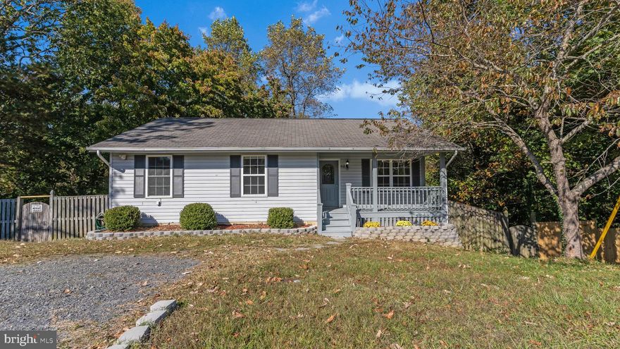 Enjoy this rambler directly across the street from an open field. Private, fenced back yard, fully finished basement with walk out. New flooring through out, updated bathrooms. This home is a short bike ride to a beach on the Chesapeake Bay. Living room with vaulted ceilings, screened in back porch off kitchen.  Three bedrooms on main level with two full baths & large 4th bedroom  on lower level with a full bath & soaking tub. Lots of parking & a spectacular view. Roof Replaced Feb. 2023