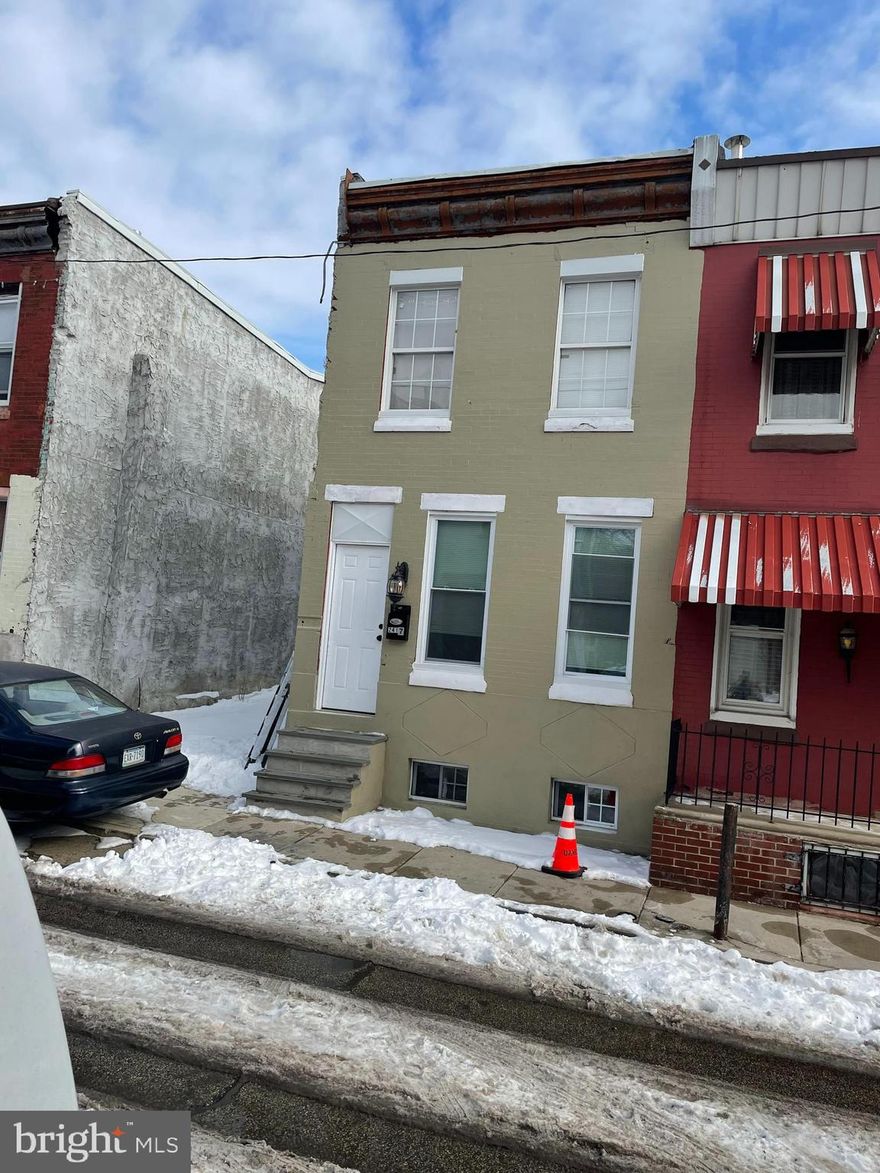 Attention owner occupants and investors. This is a unique property that is rehabbed top to bottom. It is 4 bed room home. It has 2 breaker boxes. One on the 2nd floor and 1 in the basement.  The kitchen is beautiful and offers an electrical stove. On the  1st floor there is  one bed room and  a full bath room.  The bed room could be turned in to a living room. On the 2nd flr is a full bathroom and 2 bed rooms.  There is also a kitchen on the 2nd floor. The basement has 2 full bed rooms and a utility room that has wash, dryer hookup and additional storage space. The home offers the ability to function as a duplex, student housing or perhaps using the 1st flr as an "in-law suite".  4-5 blocks from Broad  St and the Broad St line.  You are also 3 blocks from  Temple University.  Good buy and hold as Temple U grows, expands.