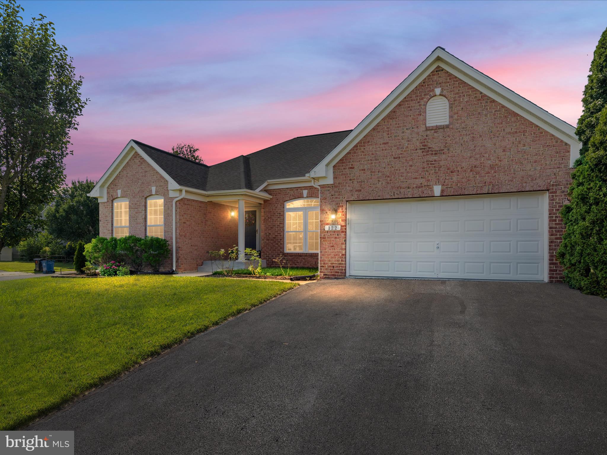 Welcome to 122 Lister Lane in the charming town of Ridgely, MD, nestled on a picturesque corner lot in the highly coveted Lister Estates community. This delightful home is a treasure trove of possibilities, catering to a diverse range of lifestyles.
As you approach the property, you'll be greeted by its stunning brick facade that exudes classic elegance, complemented by a fully fenced backyard that offers both privacy and security. The spacious patio, sheltered by an impressive stone retaining wall, beckons for outdoor gatherings, while a matching shed adds a touch of practicality and charm.
Step inside to experience a bright and airy ambiance, where large, open rooms are bathed in natural light. The heart of the home, the kitchen, is a chef’s delight, featuring an abundance of cabinet space and expansive countertops, perfect for culinary creations. Beautiful wood floors flow seamlessly throughout the main level, while cozy carpeting in select areas adds warmth and comfort.
Retreat to the first-floor master bedroom, a serene oasis complete with generous walk-in closets and a luxurious tile-floored bathroom. An elegant tray ceiling above the sleeping area enhances the room’s sophistication, providing a perfect sanctuary for relaxation.
Venture down to the fully finished basement, where you’ll discover a vibrant space designed for both entertainment and leisure. The basement boasts a full kitchen and bar area that overlook a spacious living area, making it ideal for hosting gatherings or enjoying movie nights. With extra rooms that can easily be transformed into a home gym or additional bedrooms, along with a stylish full bathroom, this lower level offers versatility to suit your needs. An additional exterior exit provides convenient access to the inviting backyard.
Just a stone's throw away, outdoor adventures await at Martin Sutton Memorial Park, where you can enjoy tennis, pickleball, a playful playground, and a thrilling skateboard park. If you crave the serenity of nature, Tuckahoe State Park is nearby, perfect for camping, exploring scenic trails, and fishing in tranquil waters. Additionally, this fantastic location is close to schools, shopping options, and provides easy access to commuter routes US-50 and Route 404, putting the beautiful beaches just minutes away.