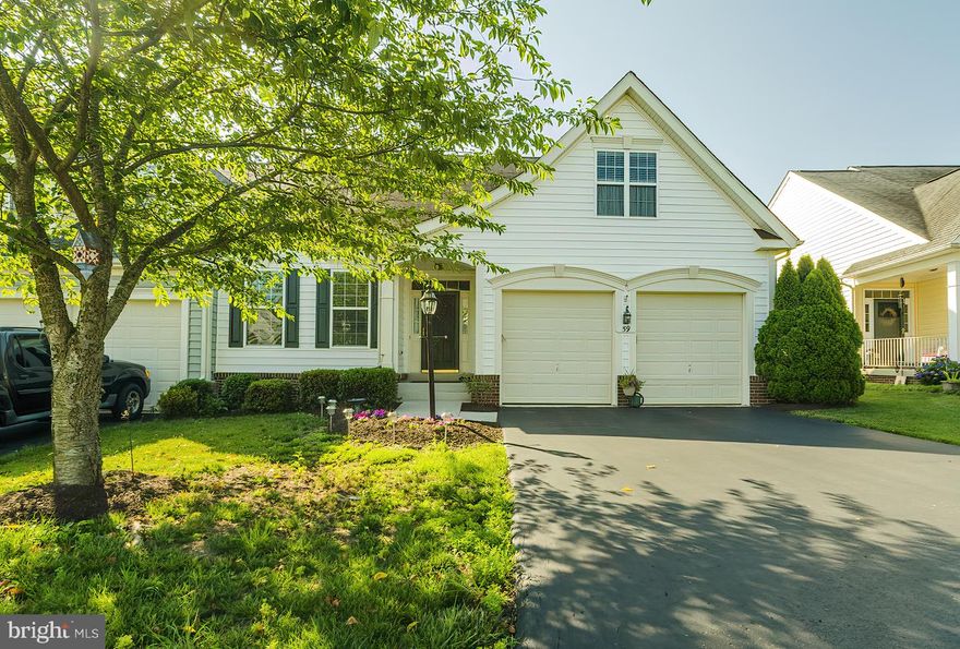 Well-maintained, new carpet, freshly painted - this 3 bedroom 3 bathroom villa property is move-in ready and in a great location, just minutes off of I-81 and located near some of the newest amenities in Berkeley County. Beautiful Hardwood floors in several areas, FP highlights the great room and opens to rear deck. Continue across the deck to the enclosed screen porch which also can be accessed from the master bedroom. The front bedroom is currently set up as a home office or access the open loft area on the upper level for your home office or hobby room. A two car garage accesses the laundry and ties into the kitchen which is fully equipped with breakfast nook.  The separate dining area can be transitioned to create whatever vision you need.  This one owner villa is ready for you.