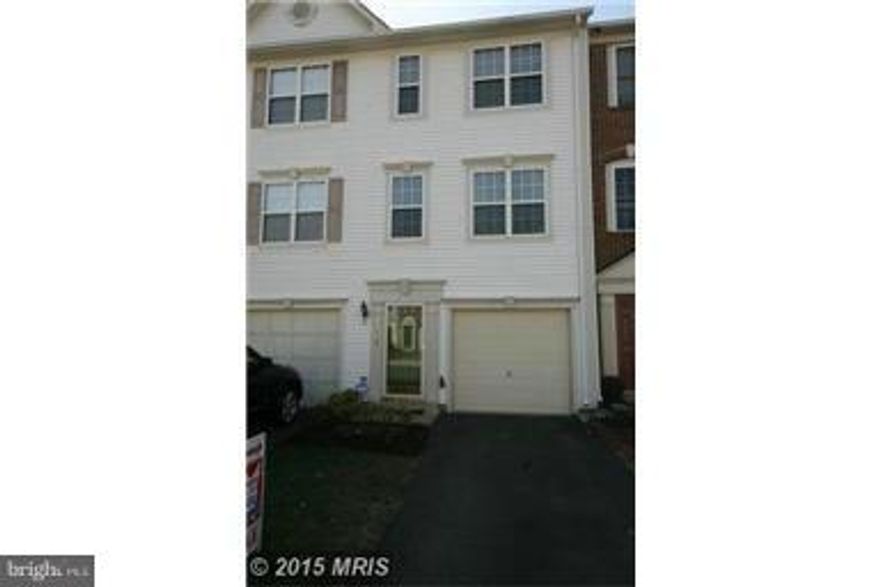Great light filled three level townhome backing to wooded conservation area.  Loads of upgrades, Large kitchen with granite counters, SS appliances,. Large master with vaulted ceiling.  Enjoy the park like setting from your deck.  Lower level features a gas FP and SGD to fenced yard. 1 car garage.Walk to W&OD trail. Approximately One mile from future Metro stop. HUGE PRICE REDUCTION!!!