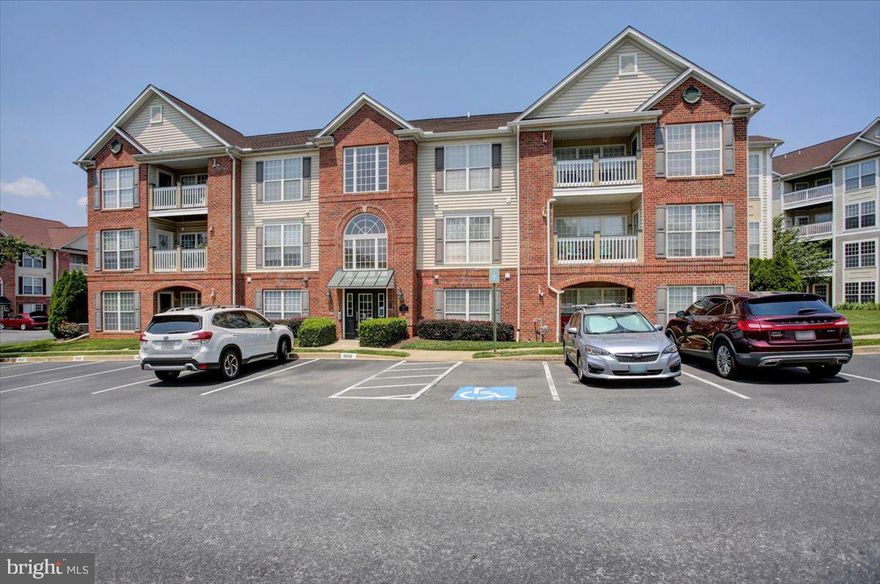 Enjoy easy access to all that Frederick has to offer from this spacious 2 bed/ 2 bath handicapped accessible ground floor unit in the desirable Whittier community- RidgeView I!  An inviting atmosphere boosting an open floor plan with kitchen (custom ceiling height cabinets), dining, and living area with custom built entertainment center creates a cohesive and inviting space.  Discover the perfect blend of elegance and functionality, featuring updated flooring, and lots of natural sunlight!  Primary bedroom includes one walk in closet with a second large closet, custom built ins, & a walk in shower.  Ceiling fans in every room.  Large guest room with plenty of closet space.  Dining area leads to an outdoor patio which is located directly in front of the assigned parking space.  Enjoy simple living with no stairs, a secure building, parking located directly in front of condo, and handicap accessible.  Enjoy mountain views, and all the amenities that Whittier has to offer- Whittier Lake, (3) Pools, soccer field, tennis courts, basketball court, walking paths, and much more! Don't miss your opportunity to live in a ground floor condo in Ridge View I! 
*Highly motivated seller, moving to Homewood retirement community in August. Seller will entertain all offers.