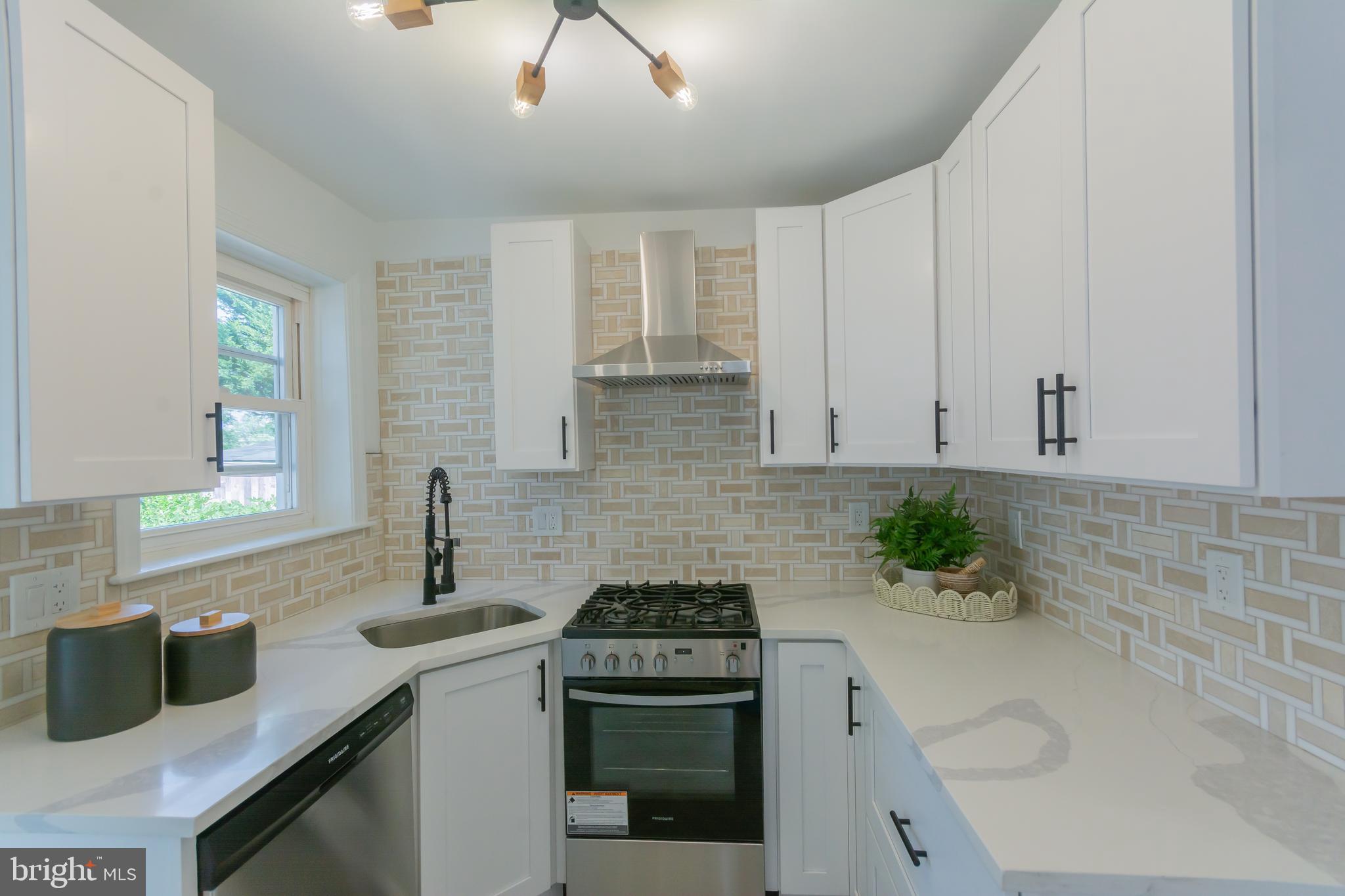 Charming single-family home fully renovated nestled in the heart of Bladensburg, MD. This delightful residence spans 1,450 square feet and offers a comfortable and inviting atmosphere with its well-designed layout. Upon entering, you are greeted by a spacious living area that flows seamlessly into the kitchen, perfect for entertaining or enjoying quiet evenings at home. The home features four well-appointed bedrooms, and a bonus sunroom for entertainment and ample space and natural light, providing a serene retreat for rest and relaxation. The full bathroom in the main level is just renovated, conveniently located and thoughtfully designed to serve all household needs efficiently. Also brings a Full bath completely renovated in the Basement and Upper level. In the basement we count with a Kitchenette/Wet Bar. Comfort is assured year-round with central air conditioning and heating, ensuring the perfect indoor climate no matter the season. The property also boasts a generous yard and a Sun Room, offering a private outdoor oasis for gardening, recreation, or simply unwinding. Conveniently located in a vibrant community, this home provides easy access to a variety of local amenities, dining, and shopping options. Don't miss the opportunity to make 5446 Varnum St your new address. Schedule a viewing today and experience all this charming home has to offer!