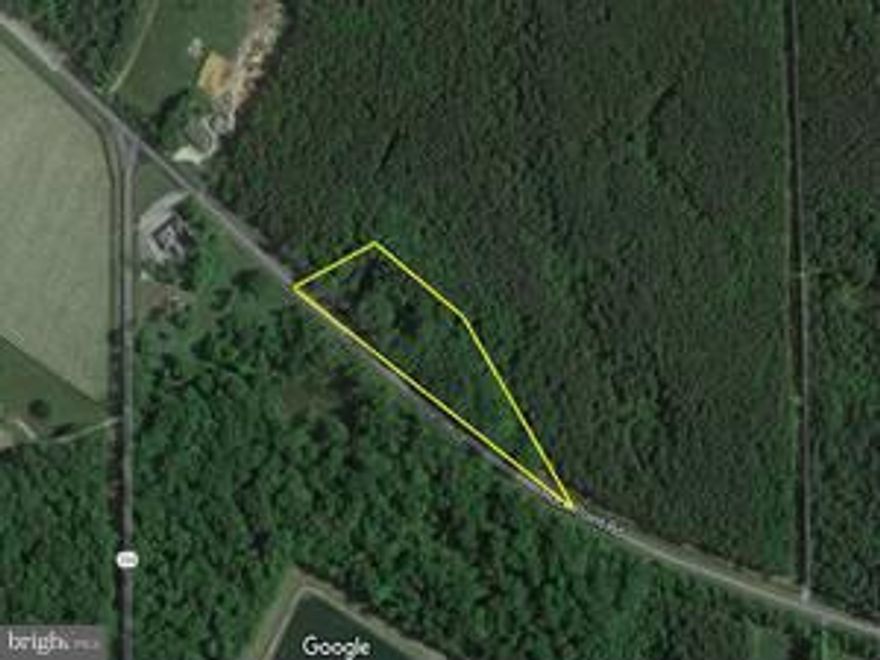 Unique opportunity to own 1.84 acres of land offering 1000ft of road frontage located across from Cobb Island off Rock Point Road. This Lot is wooded and level. Adjoining to 61 wooded acres. The Owner hunts on regular basis and notes the large population of wild stock...great for camping and all outdoor recreation use.....Where can you own a piece of the world at this price?? Use this lot to store your boat, add a large shed for storage, use this property for camping and weekend getaways!!!!!  Owner Financing possible with a decent down payment!!!!!!