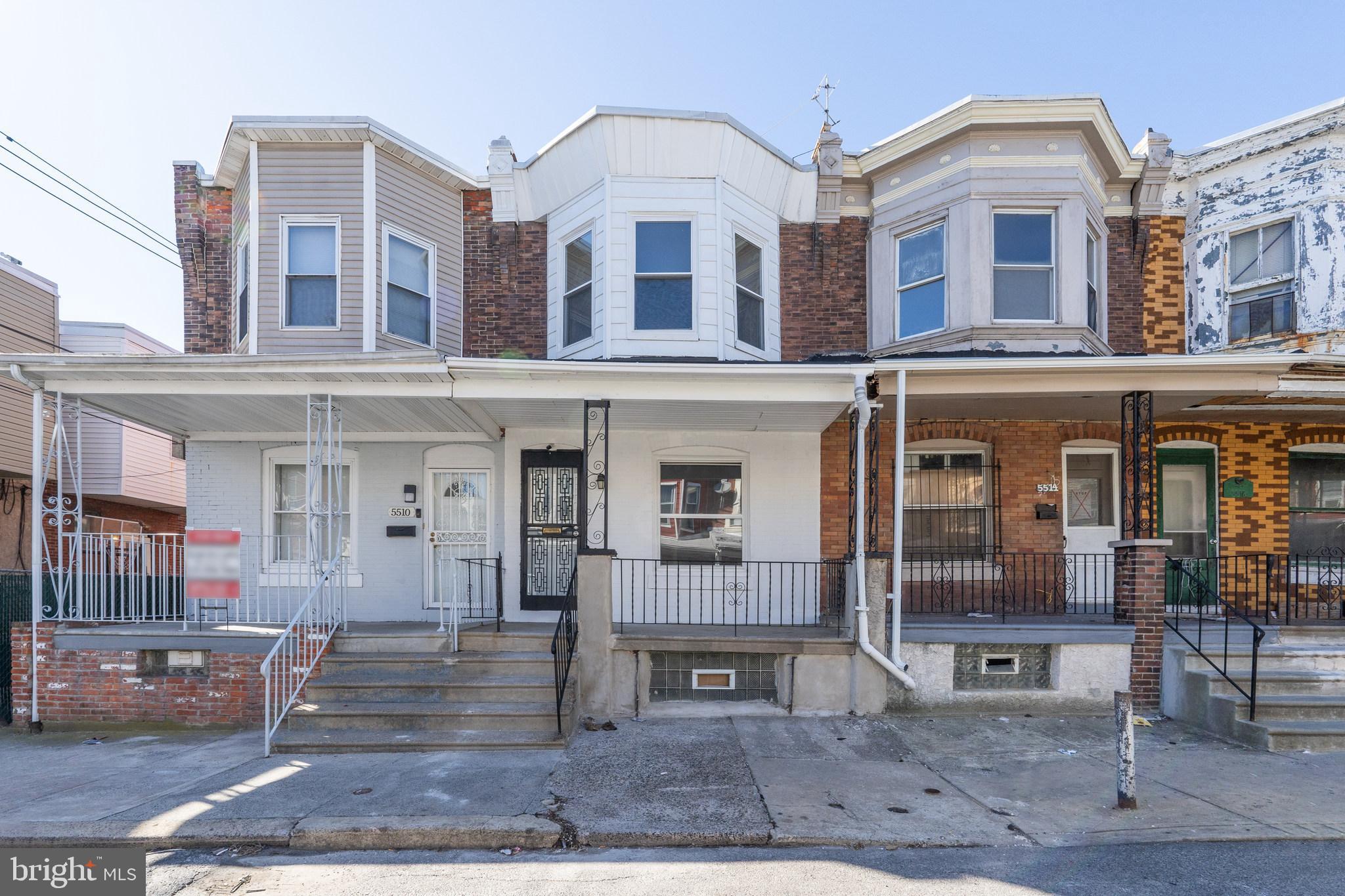 Welcome to 5512 Pemberton Street, a charming 3-bedroom, 1.5-bathroom townhouse in Philadelphia's Cobbs Creek neighborhood. Built in 1925, this 1,100 sq ft home blends historic character with modern convenience. The spacious living and dining areas provide a welcoming atmosphere for entertaining, while the functional kitchen features essential appliances, including a microwave, and ample cabinet space. Three well-appointed bedrooms offer comfortable retreats, complemented by a full bathroom and an additional half-bath for convenience. The home boasts luxurious hardwood floors, a finished basement with tile flooring and laundry hookups, and an enclosed backyard perfect for relaxation or gardening. Though it does not have central cooling, this property is a fantastic find in a vibrant neighborhood. Located near public transportation, parks, schools, shopping, and dining, 5512 Pemberton Street offers both comfort and convenience—your new home awaits!