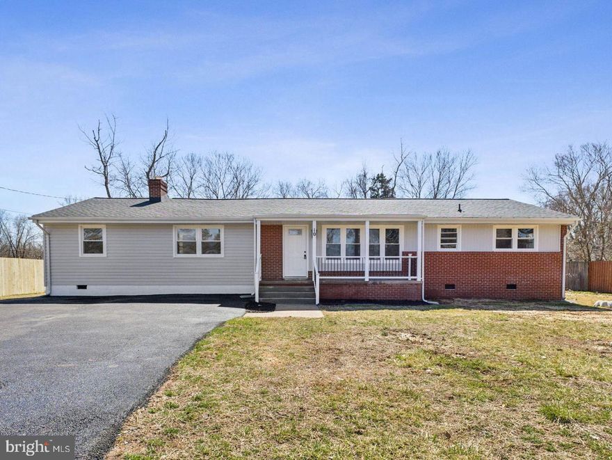 *15k Price Drop*Looking for a luxurious, newly renovated home with no future maintenance worries? This stunning single-level rambler has been completely upgraded, offering the perfect blend of modern style and long-term peace of mind. Enjoy a brand-new roof and HVAC (2024), along with new siding, soffits, gutters, driveway, windows, public water connection, septic tank, distribution box, conveyance pipes, and a fully insulated crawl space with a vapor barrier. Inside, the home boasts fresh paint, modern lighting fixtures, stylish new flooring, a completely remodeled kitchen with custom cabinetry, quartz countertops, backsplash, and stainless steel appliances, plus two spa-like bathrooms with custom vanities, porcelain tile, and brand-new showers. Offering four spacious bedrooms, including two master suites, a bright and airy living room, a breathtaking dine-in kitchen, and a convenient laundry room, this home is designed for comfort and style. The freshly painted and repaired deck overlooks a beautiful, flat lot full of possibilities. No HOA! Ideally located just minutes from major highways, shopping malls, and the VRE station (only 5-6 minutes away), this is truly a rare opportunity you don’t want to miss!