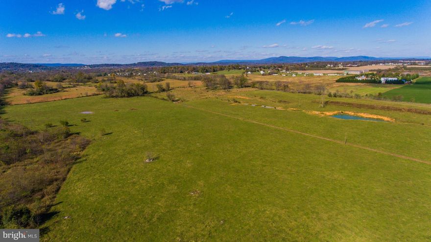 172.46 ACRES, MORE OR LESS, LOCATED JUST SOUTH OF HAGERSTOWN, MD. AND MINUTES FROM INTERSTATE 81. FANTASTIC DEVELOPMENT OPPORTUNITY WITH PUBLIC UTILITIES AVAILABLE. RAW LAND WITH GREAT POTENTIAL, RESIDENTIAL, COMMERCIAL OR INDUSTRIAL. NO ZONING IN BERKELEY COUNTY.  ALL STRUCTURES ON PROPERTY CONVEY "AS IS" CONDITION.  OWNER IS A LICENSED REAL ESTATE AGENT IN WV. WATER ACCESS AVAILABLE. SEWER IS APPROXIMATELY 200 FT. FROM  PROPERTY.